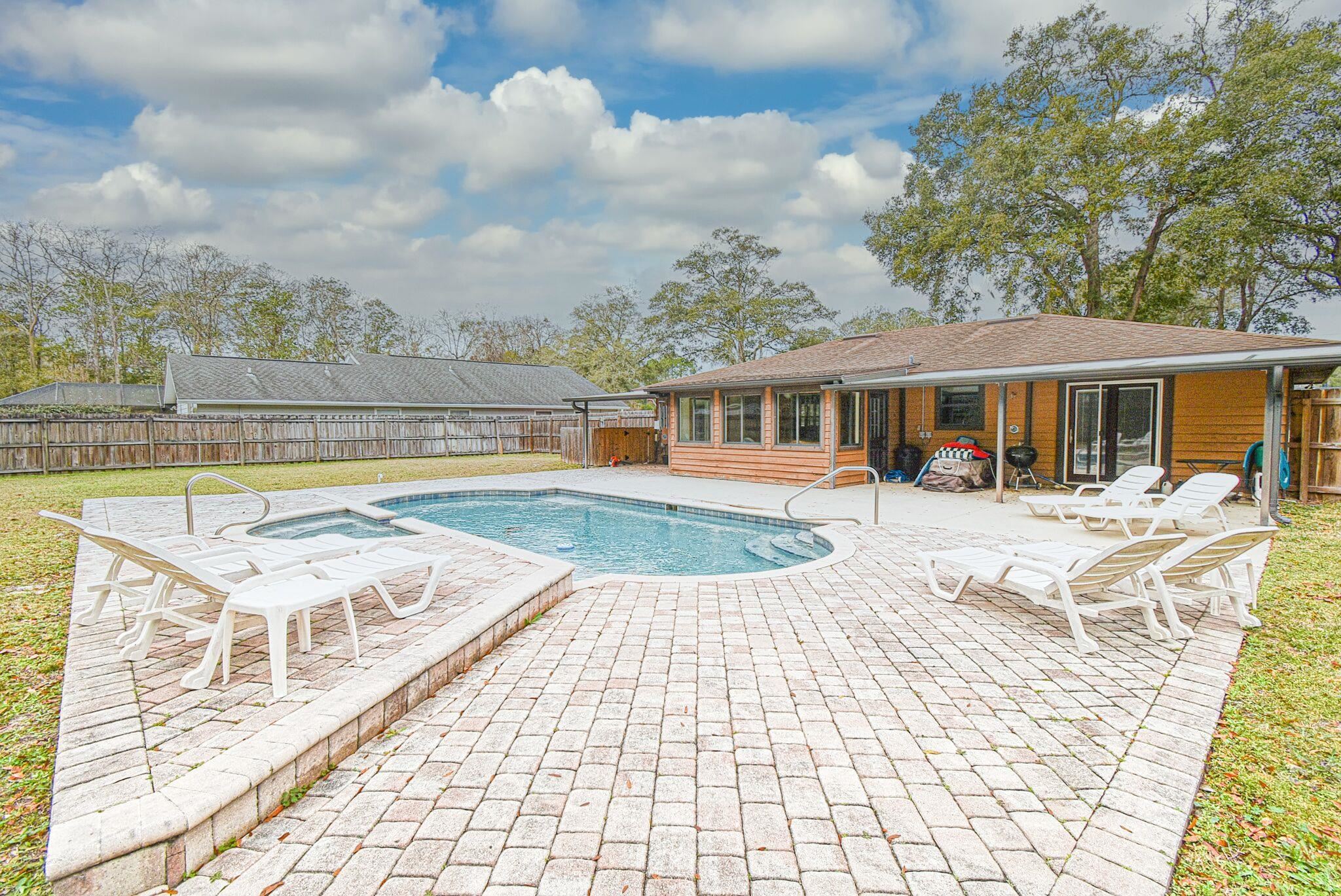 Home Sweet Home! Pool home with fully fenced backyard on approximately half acre lot with a 3/2 split floor plan with a side entry full 2 car garage. All tile flooring ready for new owners to make this beautiful house a Home. The heated pool is 26x16 surrounded by pavers makes for a private oasis all year round. Call your realtor for a private tour. NEW ROOF ON IT'S WAY! Roof is being replaced by sellers.