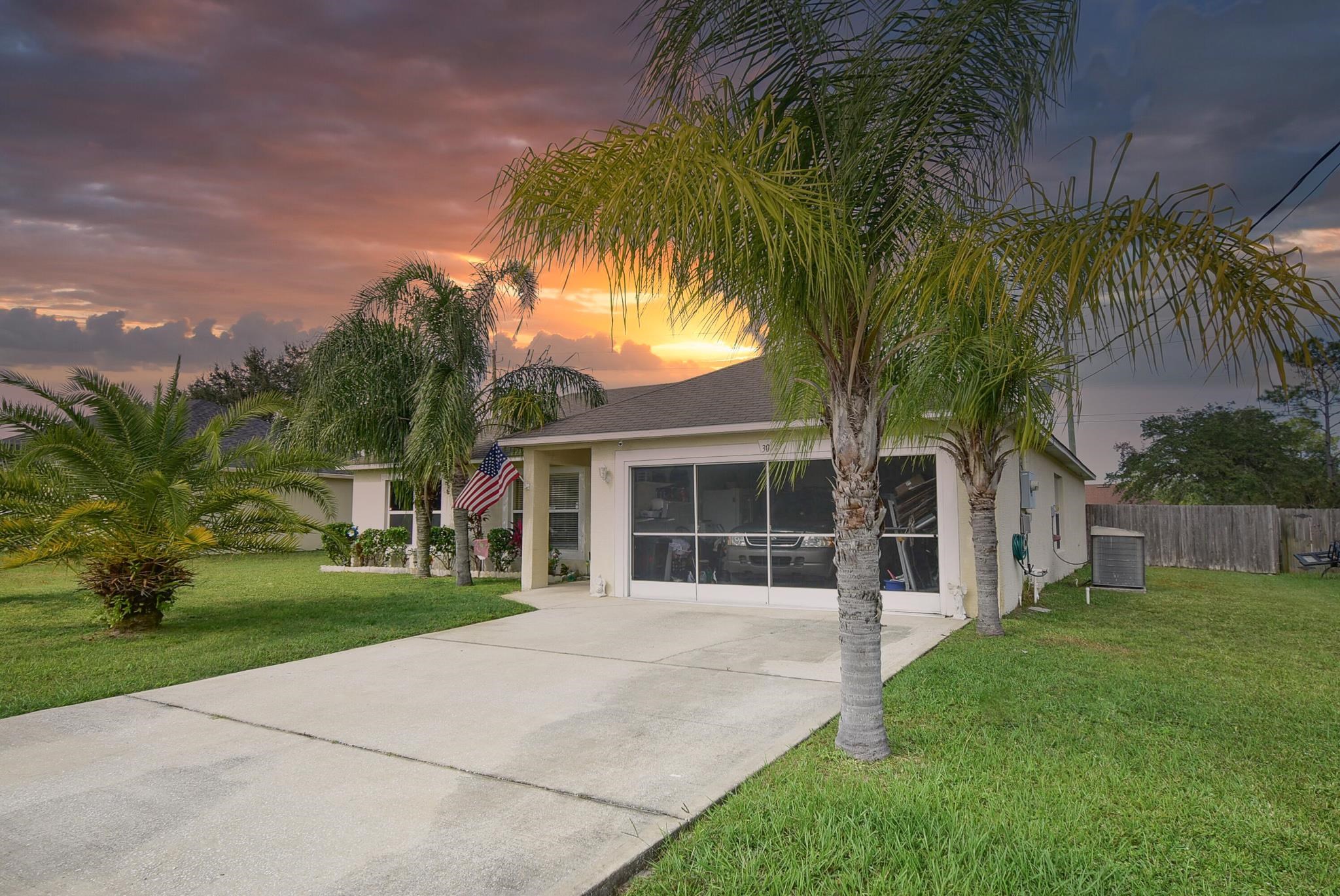 Great curb appeal, convenient to shopping.  This 3Br/2Ba has a formal L/R plus a  Dining/Family room combo. Enter into the formal living room, off of it, is a huge primary suite with a Safe Step Walk In Jetted Tub/Shower in it's bathroom. The two guest bedrooms, the guest bath and the laundry are on the other side of house off the family room. Upgraded Slider door to the patio off the dining room. The home is tiled thru out no carpet. Kitchen is updated with granite counters tops, Nice wood cabinets.  The two car garage is 20X20 has a screen door so you can leave the door open and get a nice breeze.  Front door has a storm door allowing more of the Florida Sunshine to enter. The landscaping, sprinkler system with well and fenced back yard are just a few of the extras.                           New Roof to be completed prior to closing!