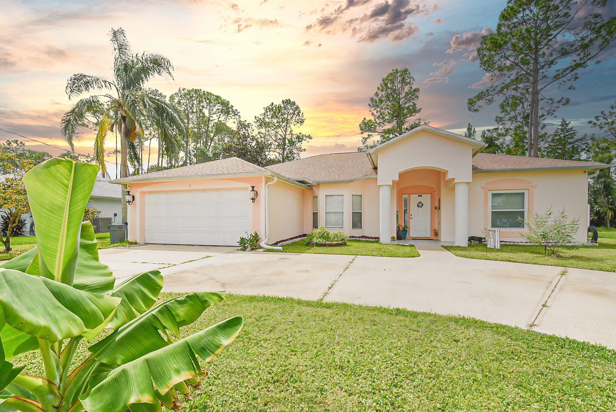 Great 4 bedroom 2 bath home featuring a Screened salt water pool with water feature. A large covered and uncovered lanai area, Pool is 3 ft to 7 ft deep, pool deck area has a maintenance free Flaked Epoxy finish, your out door kitchen has a great start with a sink/work center and the cage screening is new. The Back yard is fully  fenced with a white vinyl fence. Come inside, the foyer is tiled and bringing you to a large living room with blond wood look flooring which flows thru out the house except the Kitchen and Baths. The Kitchen has large tile flooring, new stainless steel appliances, plenty of cabinets and a large pantry. The guest bath sits between bedroom 3 and 4 and has been updated with a new vanity, lighting, mirror and a custom Epoxy gray marble swirl flooring, this one has a tub/shower combo. The Primary Suites Bathroom (11x15) has been updated and features a soaking tub and separate shower, new dual vanities and the Custom Epoxy Gray/White Marble swirl flooring.
