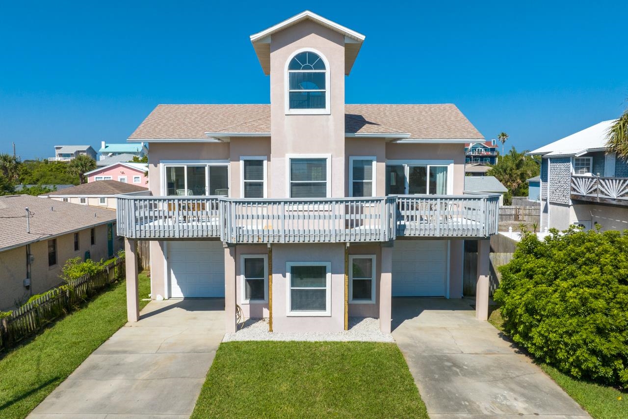 Great Location, Short Term Rental Pool Home!  Ocean Views and so much more! Walk over to the White Sandy Beach in minutes or spend the day in the privacy of your own pool. This Home has so much to offer and so much more available.  Enter the first floor from either side garage into a large Foyer. The Ground Floor has a Flex/Great room with sliders to the back yard and pool area. There is a full bath a storage closet and a bedroom on this level also.  The Second Floor has an Open Floor plan, L/R - D/R -  Kitchen. The Primary Bedroom is to the left of L/R with a huge In Suite Bathroom plus a 14x16 Balcony off this Suite. The second bedroom on this floor is to the right, with a In Suite bath and a 14x16 Balcony off it also.  Behind the kitchen area is an entrance to the 2nd bedrooms full bath, a laundry/Utility room, a built-in office area and another balcony 17 x 6 across the back of the home.  The 3rd Floor Crows Nest is set up as another bedroom with Amazing Ocean Views.