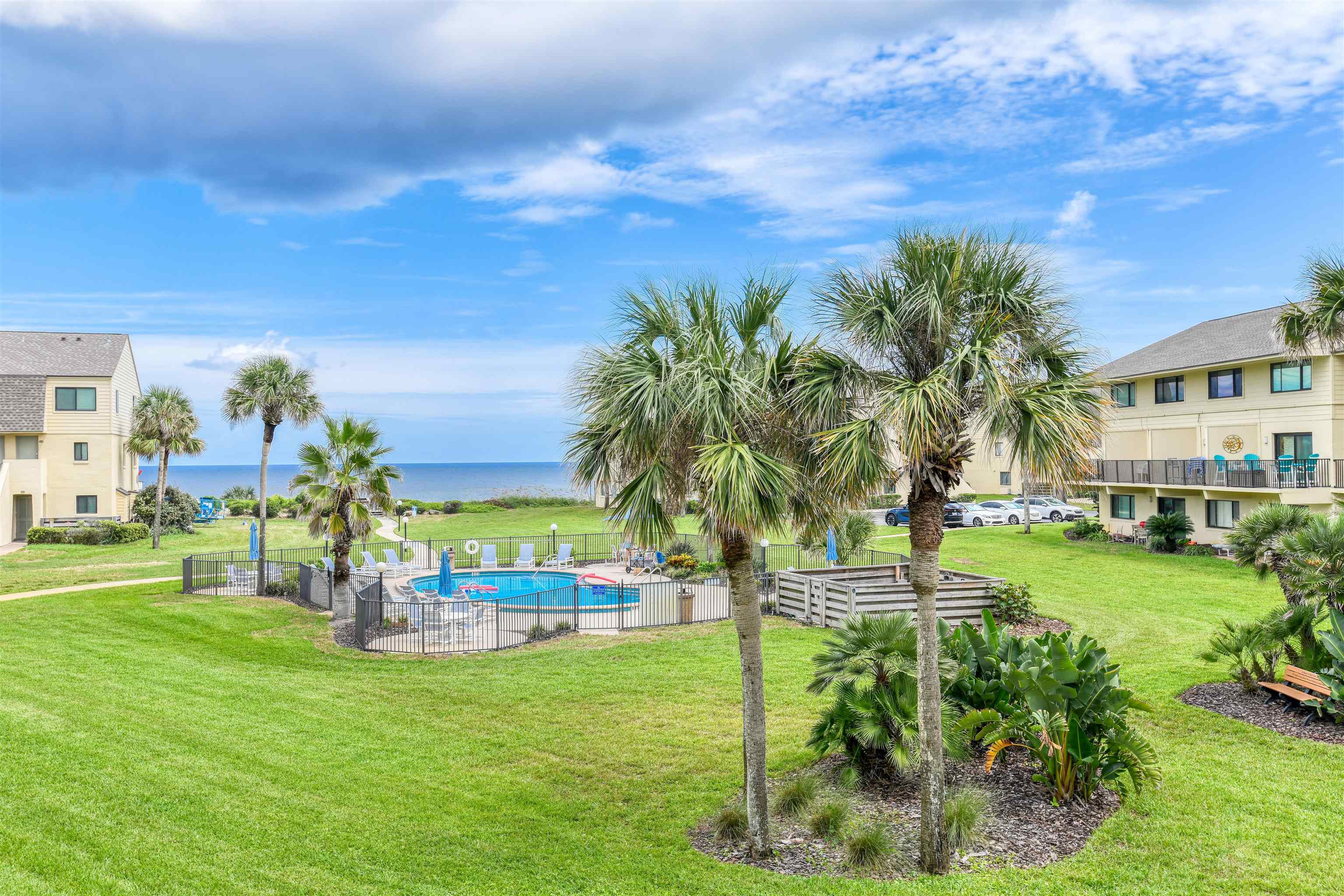 Welcome to your coastal retreat in Summerhouse Beach and Racquet Club! This exquisite 2-story, 2-bedroom, 2.5-bath townhome has been beautifully remodeled, offering a perfect blend of modern luxury and relaxed beachside living. As you step inside, you'll be greeted by an inviting open-concept living area with brand-new flooring that extends throughout the home. The spacious living room is ideal for entertaining or relaxing, while large windows frame stunning views of the ocean and the sparkling pool. The heart of this home is its gorgeous, recently updated kitchen. Featuring sleek stainless steel appliances, elegant countertops, and ample cabinetry, it’s a chef’s dream. Upstairs, the primary suite is a true sanctuary with its beautifully remodeled bathroom with a large walk in shower! Step outside onto your private balcony to take in breathtaking ocean views and watch the waves roll in! This building has also has has new extensive repairs such as a new roof and replumbing!