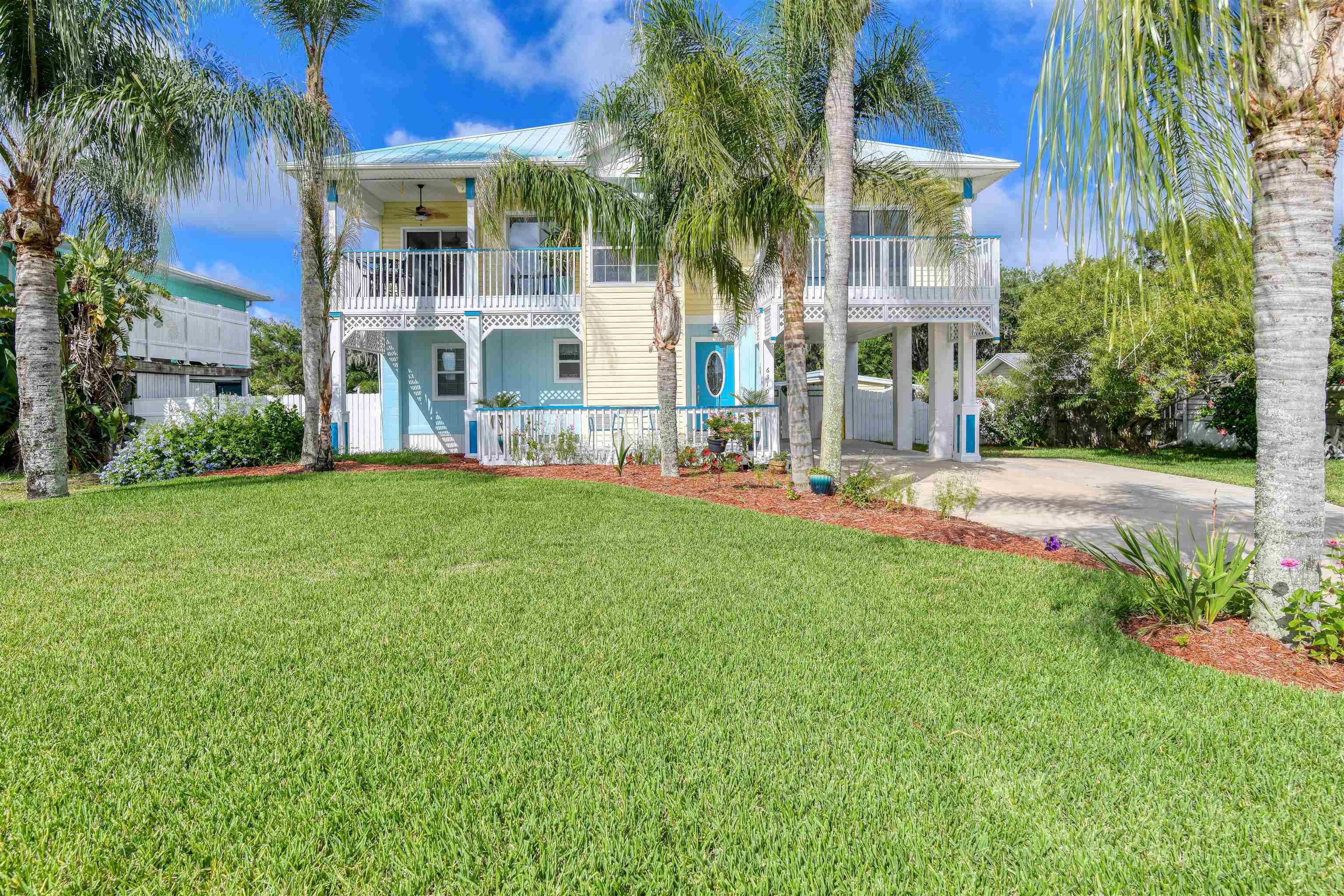 Discover coastal living at its finest in this immaculate two-story home nestled in Treasure Beach. Boasting 3 bedrooms and 2.5 bathrooms, this property offers both comfort and style with picturesque views of the canal and intercoastal waterway. On the main floor you will find two bedrooms and a bathroom. As you go upstairs you will find a large living room and open kitchen with a dining nook. The kitchen offers beautiful granite countertops with stainless steel appliances. In the Primary Suite you are greeted with amazing views of the canal from the private balcony, and a large En-suite bathroom! You will fall in love with this lush backyard that has its own private floating dock, a shed/workshop, and ample space to add a pool! Also, this home offers plenty of room to add an elevator as well!  This could be your new family home or Short Term Investment property!