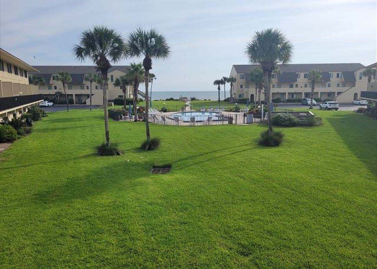 Welcome to this beautifully remodeled two-story condo, offering a perfect blend of modern living and resort-style amenities. With brand new LVP flooring, updated bathrooms, and a sleek, modern kitchen featuring granite countertops and stainless steel appliances, this home is move-in ready and designed for comfort and style. Enjoy breathtaking direct views of the pool and ocean right from your balcony. Located in the highly sought-after Summerhouse community, this gated resort-style property offers everything you need for a luxurious lifestyle. With four temperature-controlled pools, four beach walkovers for easy access to the sand, and a full-time office manager to assist with your needs, Summerhouse ensures you have everything at your fingertips. The community also features tennis and pickleball courts, basketball courts, a playground, a clubhouse, and RV/boat storage parking! Whether you're looking for a permanent residence or a vacation getaway, this condo offers the ideal setting!