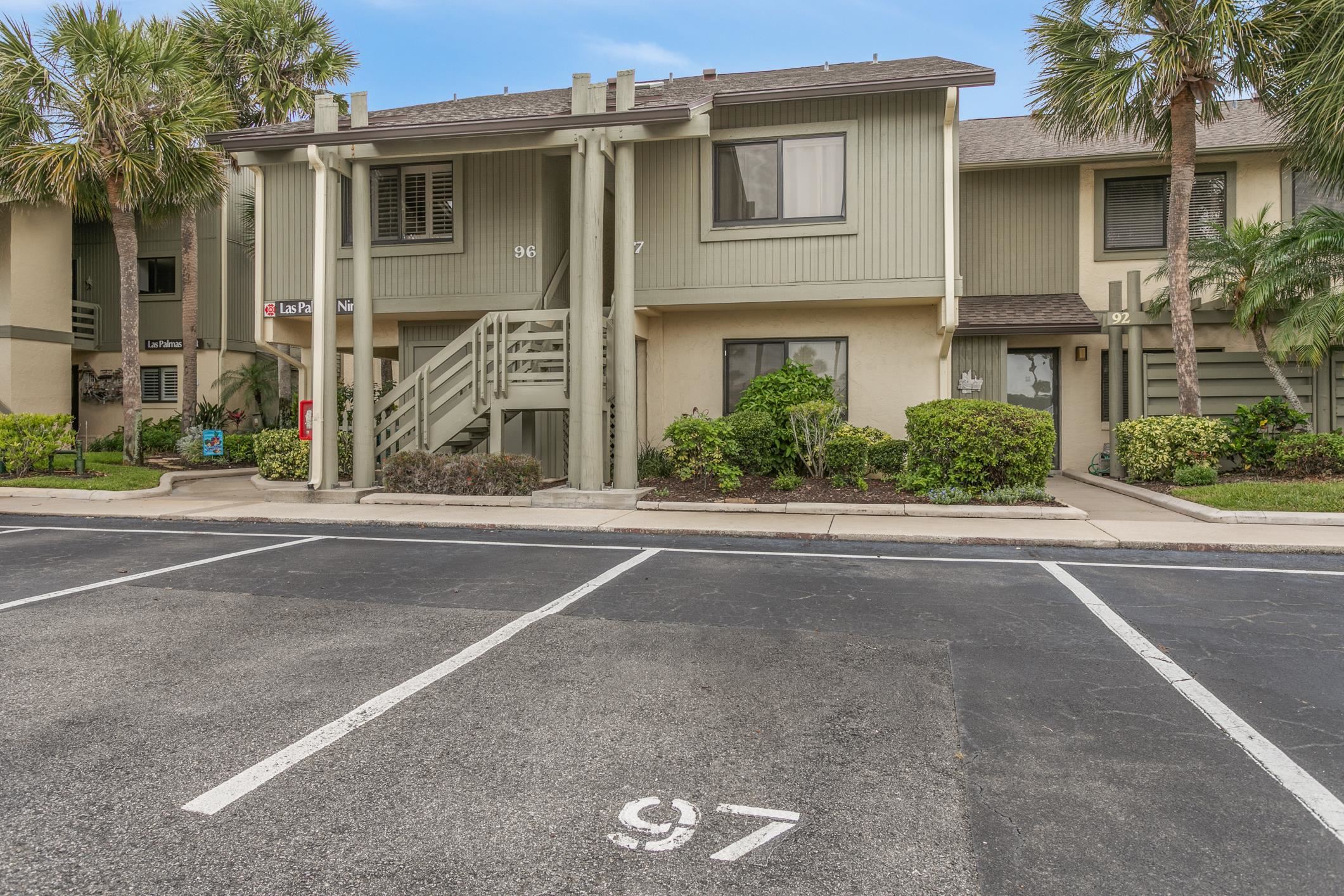 Welcome to 97 Village Las Palmas, a beautifully updated 2-bedroom, 2-bath condo nestled in the sought-after community of The Ocean Gallery in St. Augustine, Florida. With 1,098 square feet of comfortable living space, this second-floor unit offers a stylish and turnkey retreat perfect for vacationers and second-home seekers alike. Step inside to find an updated kitchen and baths, sleek tile flooring, and a serene screened-in porch overlooking the pool and lake combo view. Sold fully furnished, this condo is ready for immediate enjoyment or income generation. Ocean Gallery provides a resort-style lifestyle with direct beach access, indoor and outdoor heated pools, a fitness center, clubhouse, saunas, bocce ball, tennis and basketball courts, and beach equipment. HOA fees cover water, sewer, cable, internet, pest control, grounds and amenity maintenance, and 24-hour security. This unit is currently utilized as a vacation rental and second home, with over $21,000 in future booked rentals.