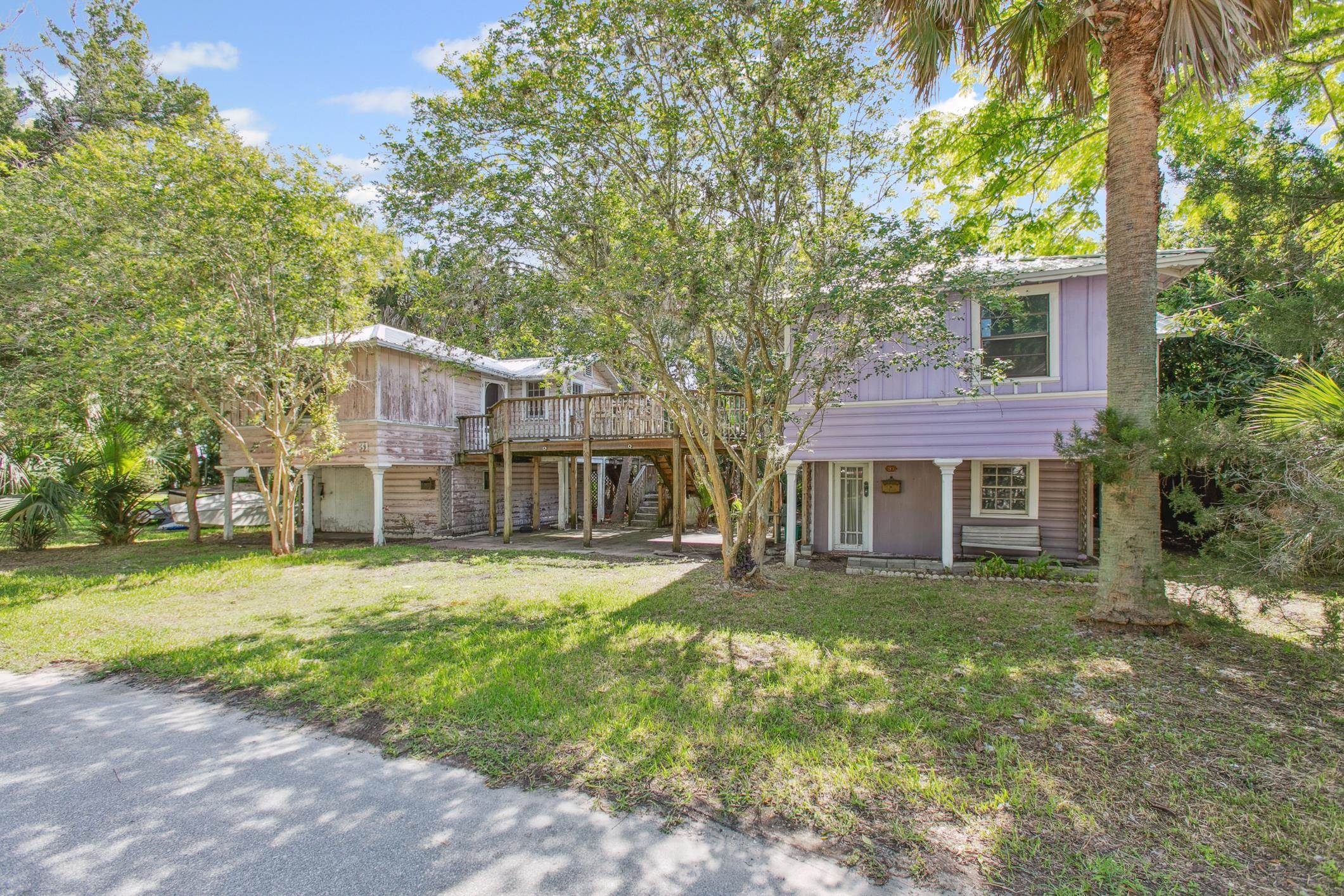 Asking for all highest and best offers by Friday June 20th at 2pm! Rare Investment Opportunity in Lighthouse Park on Anastasia Island! Don’t miss your chance to own this unique duplex perfectly situated in the highly sought-after Lighthouse Park neighborhood. Just minutes from historic downtown St. Augustine, shopping, dining, and the pristine beaches of Anastasia Island, this property offers the ultimate in location and convenience. Each unit features its own dedicated septic tank and separate water and electric meters, making management simple and efficient. Even more, this parcel can be split into two separate lots, offering additional future potential. Whether you're looking for a savvy investment, vacation rental, or multi-generational living, this is truly a one-of-a-kind opportunity!