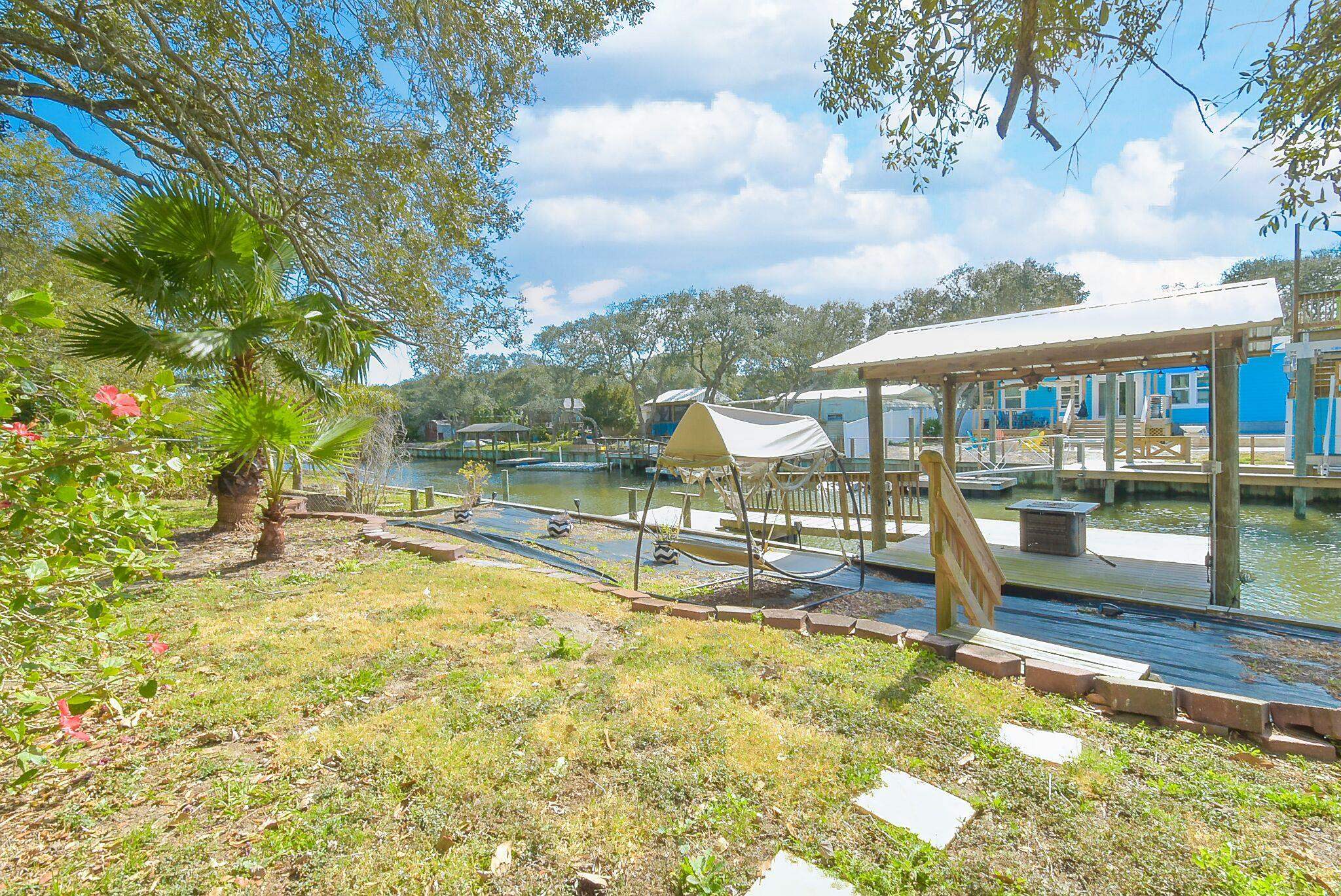 Welcome to your charming retreat in the sought-after Treasure Beach community! This delightful 2-bedroom, 2-bath mobile home offers the perfect blend of comfort, character, and location. Featuring new windows and a fun retro vibe, this property exudes personality while providing modern updates for peace of mind. Situated directly on the canal, you can enjoy serene water views and the convenience of launching your kayak or boat just steps from your back door. Treasure Beach residents enjoy private beach access, making it easy to spend your mornings with your toes in the sand. With no HOA, you have the freedom to truly make this home your own. Perfectly located near shops, restaurants, and the vibrant charm of Historic Downtown St. Augustine, this home offers the ideal balance of relaxation and convenience. Whether you’re seeking a full-time residence, a vacation getaway, or an investment property, this Treasure Beach gem checks all the boxes!