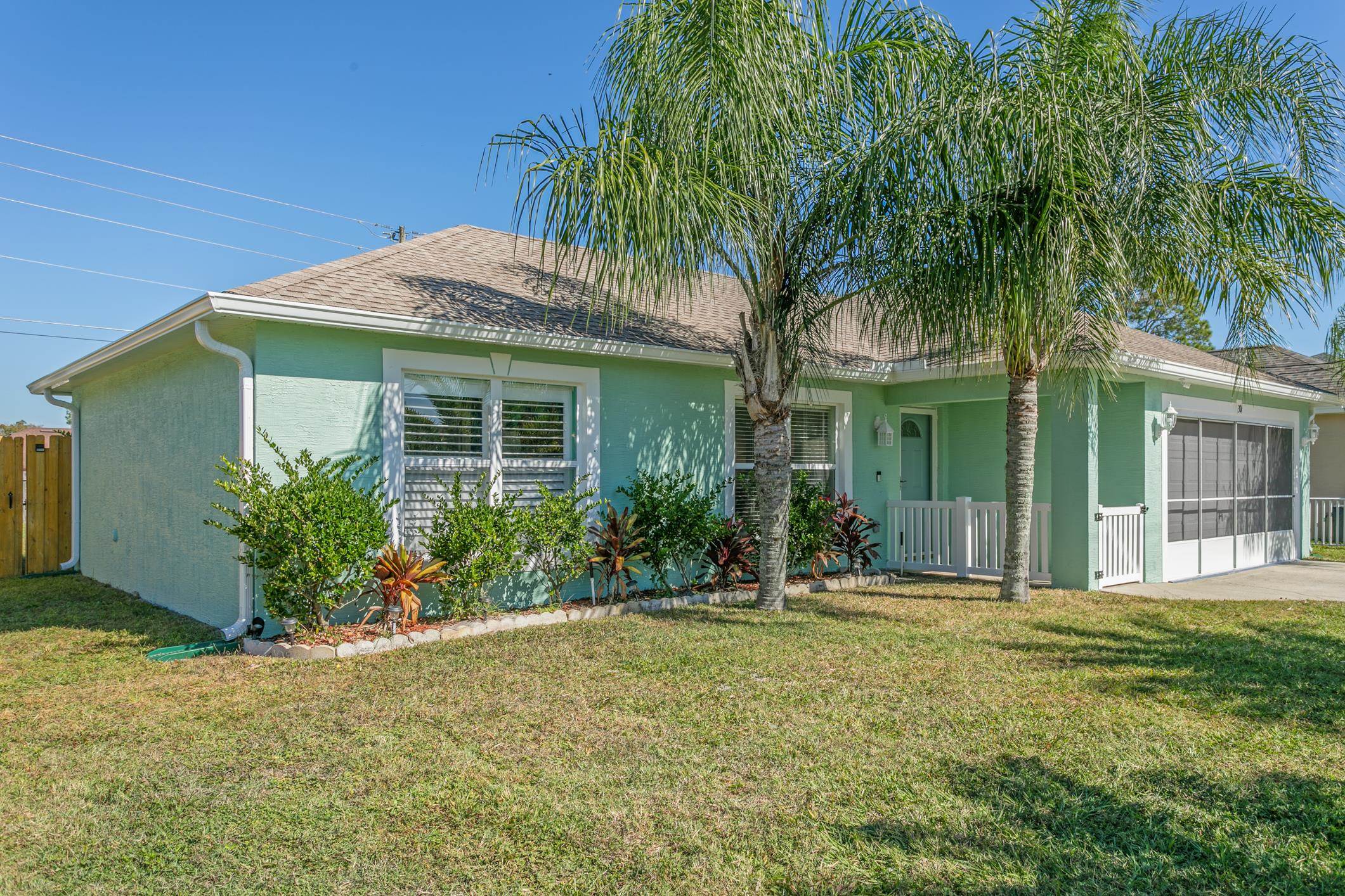 Better Than New... This concrete block home has steal studs not frame.  New Roof, New A/C Updated Baths and Kitchen. Beautiful Granite Counter Tops, Back Splash,  Large Island with Extra Drawers, New Appliances, New Interior and Exterior paint.  Plantation Shutters, New Front Door and Garage Screen. Split Floor Plan, A Family Room and Separate Living Room. Fenced back yard with plenty of room for a pool. A Charming gated entry with storm door welcomes you home. Laundry is inside the home.  This is a Must See to Appreciate.  Seller will consider selling furnished with the right offer.