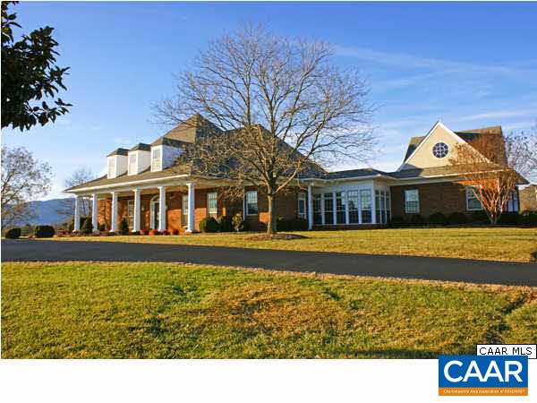 AWE-INSPIRING BLUE RIDGE MOUNTAIN VIEWS abound from virtually every room in this stately, one-of-a-kind, brick Colonial located in Foxchase—one of Western Albemarle's most highly regarded neighborhoods. With over 6,100 finished sf of living space, this immaculate 5 BR (1st floor master), 4 full & 2 half BA home offers a combination of elegant & comfortable living spaces, office/study, media room, custom built-ins, beautiful hardwood floors & so much more!
