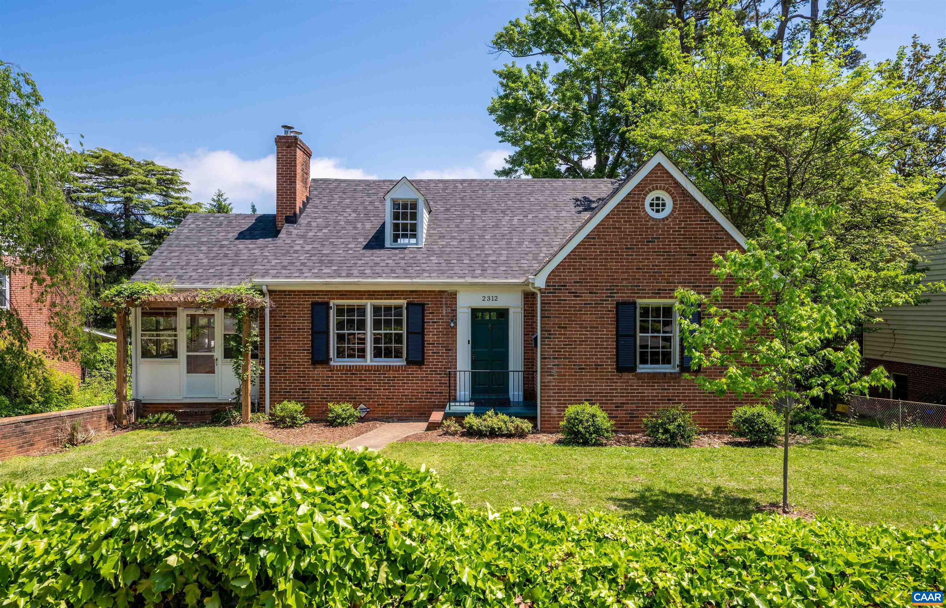 Handsomely updated 5BR, 3 full BA Fry's Spring cape cod-style brick house offering an abundance of custom wood work and charming nooks. Walkable to UVA Grounds and Medical Center, close to Downtown Cville and I64. Lovingly maintained by current owners, wonderful stewards focused on long-term improvements intending to stay for many more years. Enter the inviting living room with wood-burning fireplace (fully stocked wood pile conveys) which connects to 3-season screened sunroom overlooking the rear fenced yard (with separately fenced garden spot). At the back of the house is the DR and renovated kitchen which opens onto cozy screened porch (dog door included!), with steps down to rear yard, complete with custom stone patio and fire pit. Two bedrooms and full bath with tub/shower on the main level, second floor complete with expansive primary bedroom, remodeled full bath and fourth bedroom with special reading nook hideaway! Finished basement noted as 5th bedroom but could offer revenue stream as walk-out efficiency apartment, with top-to-bottom renovation completed May 2022. Other recent improvements include 2021 30-yr architectural shingle roof, 2021 high SEER HVAC, interior paint, R30 attic insulation, extensive tree maintenance.