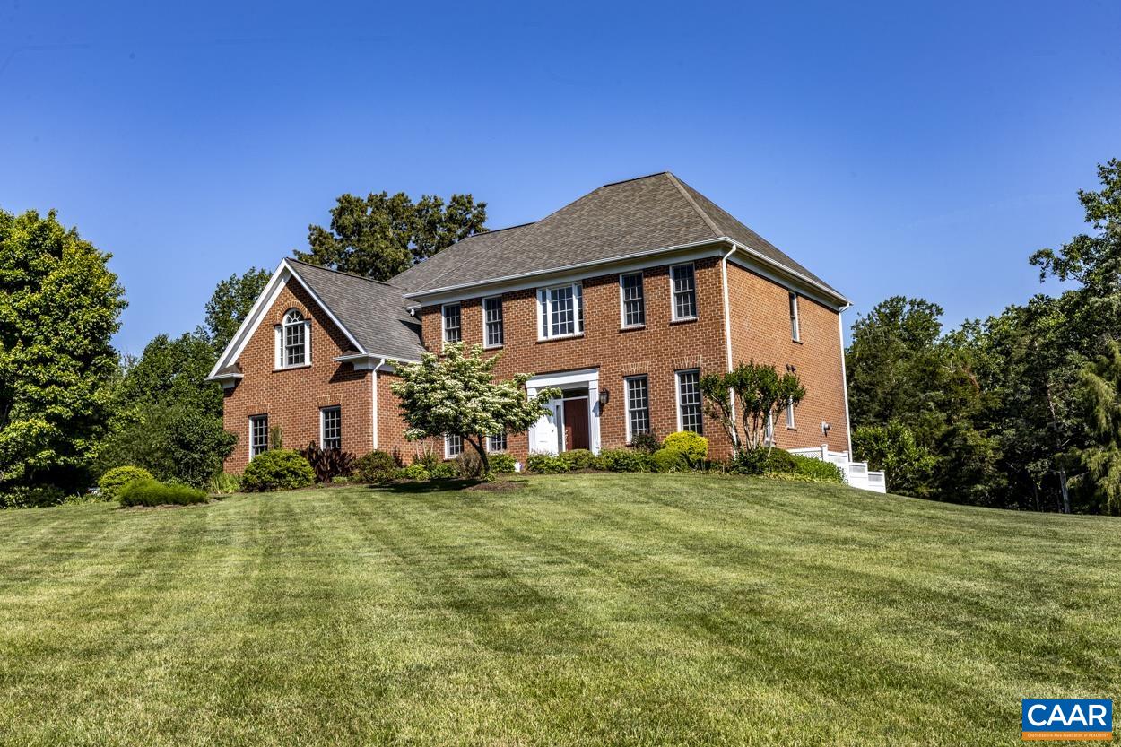 CUSTOM BUILT by Gaffney Homes with 4 bedrooms, 4.5 baths and a large rear deck overlooking a well-manicured yard with views of Earlysville Forest Pond in the Winter.  KITCHEN WAS COMPLETELY REMODELED IN 2021 with Dovetail White Cabinetry, RIVER BLUE HONED QUARZITE COUNTERTOPS and THERMADOR DOWNDRAFT COOKTOP.  Kitchen is open to the GREAT ROOM WITH GAS FIREPLACE AND BUILT-IN CABINETS.  Kitchen and Sunroom open to the spacious Trex Deck overlooking the nearly level backyard.  EXPANSIVE MASTER SUITE with Light-Filled Sitting Room, SEPARATE VANITIES and Walk-In Closet open to Bedroom and Bath.  Three additional bedrooms and two baths plus Laundry complete the 2nd Floor.  TERRACE LEVEL includes Family Room with GAS FIREPLACE and Pool Table, Full Bath, Craft Room and Twin French Doors to the Rear Patio.  Additional features include WHOLE HOUSE GENERATOR, garden plot, and 3-CAR GARAGE. Walnut Hill, a private gated community with Clubhouse, Pool, Playground, Tennis, Pond, Trails and more.