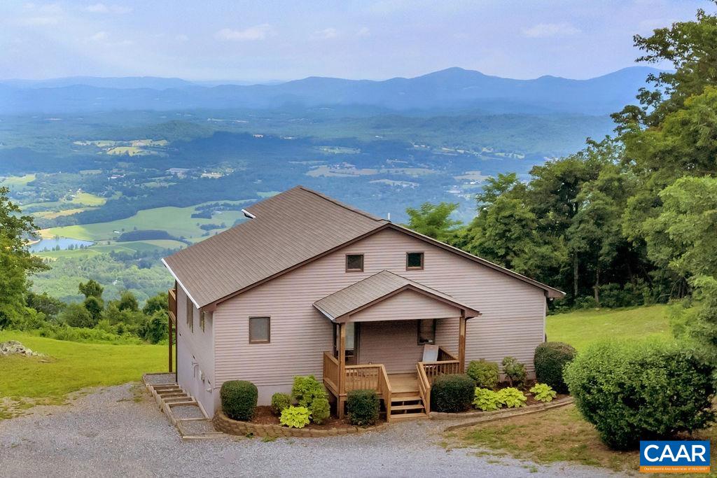 Just off the Blue Ridge Parkway, vacation year round in this truly million dollar view chalet! This one owner home is perfect for a weekend retreat, possible air bandb, mountain getaway or full time home. The views are *stunning!* Open floor plan with tall ceilings, appropriately appointed kitchen, gas fireplace in living room plus second floor loft create a comfortable space. The 2 1/2 car garage with electricity offers many uses. Along with a whole house generator and no HOA, properties like this are indeed a rare find. New HVAC May, 2019, New roof October, 2021. Internet from Lumos. TV/cable provider was Dish.
