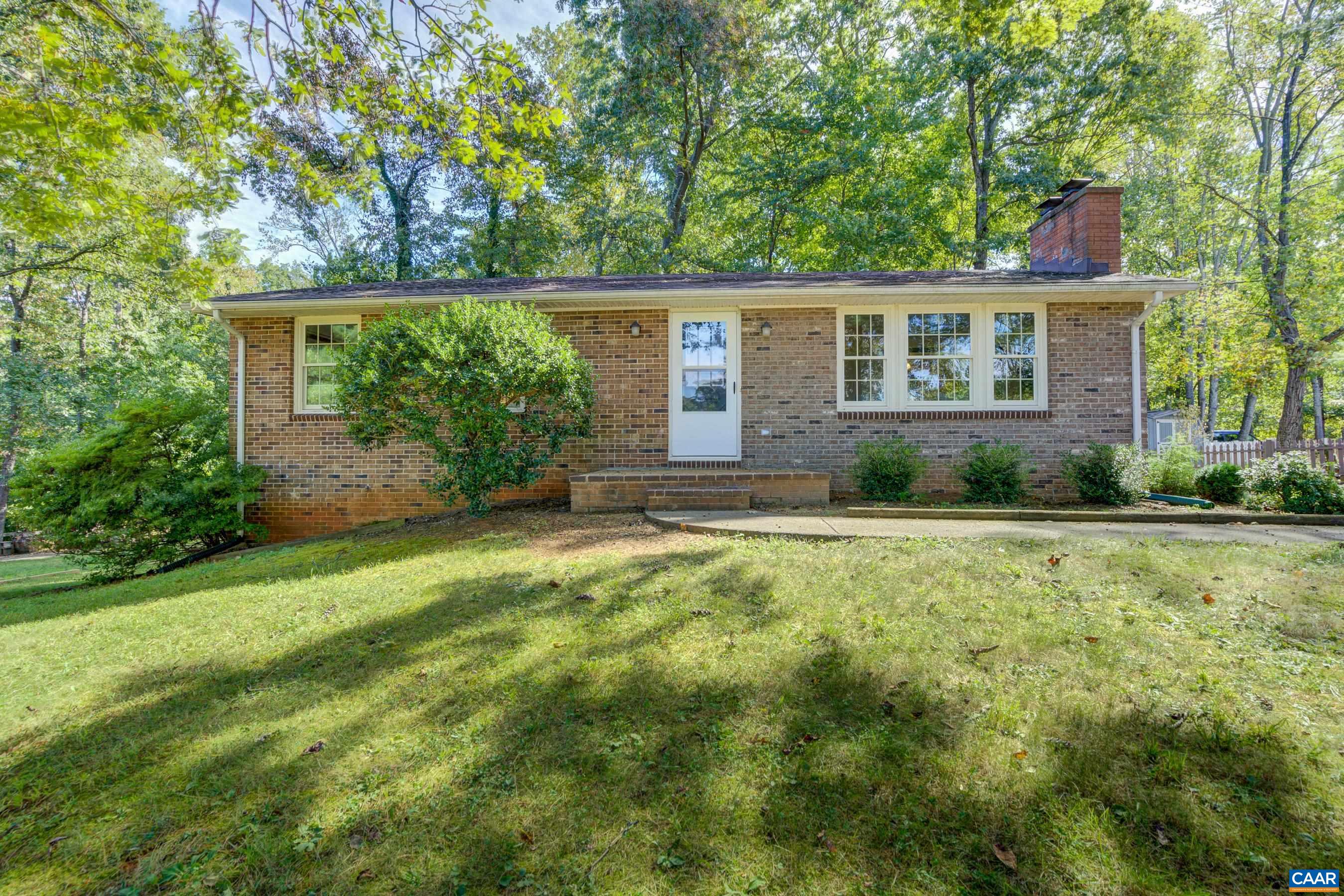 Lovingly maintained all-brick home on half an acre just minutes from the popular Chris Greene Lake.