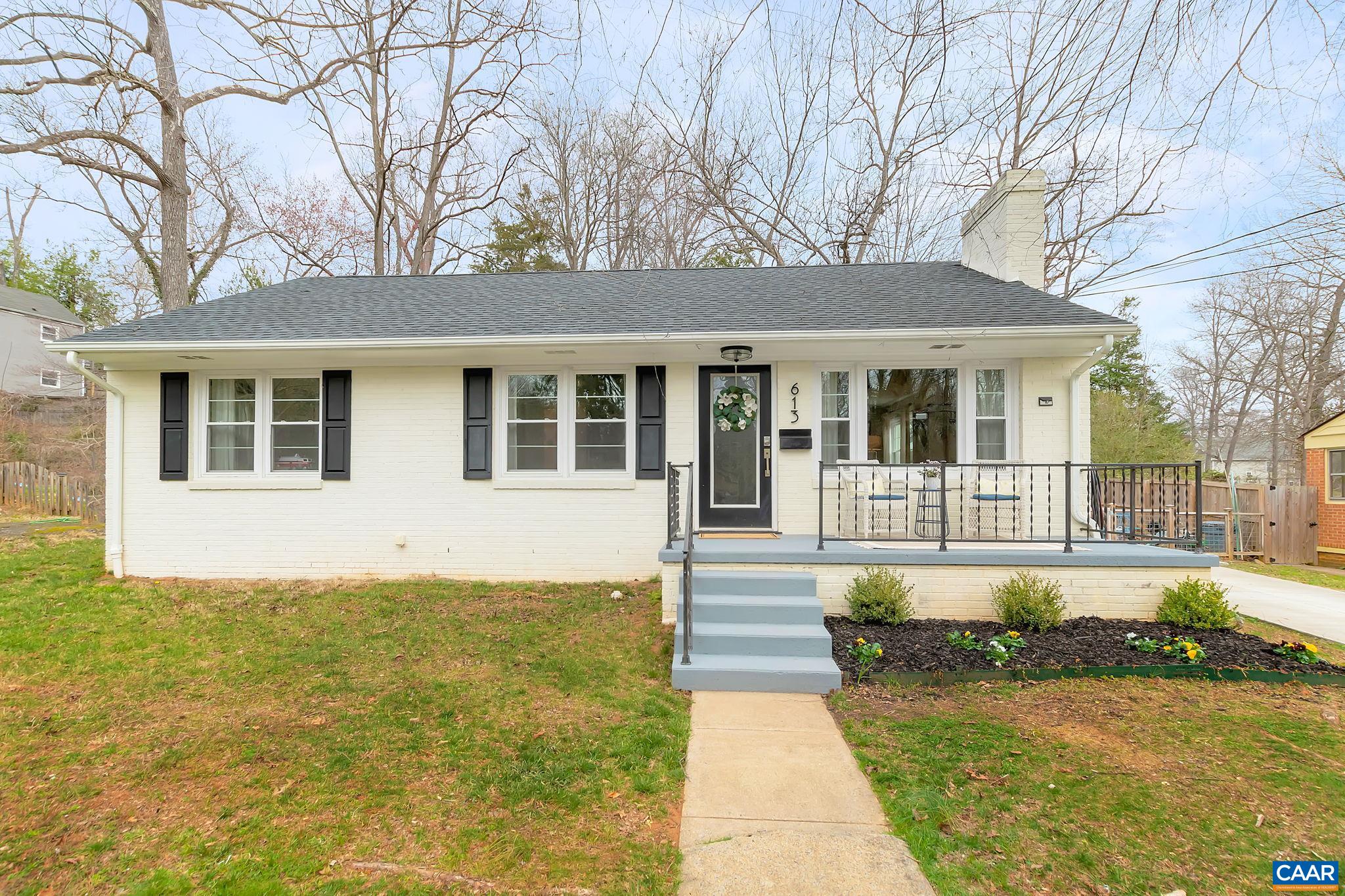 OPEN SUN (3/12) 2-4PM.  Fantastic opportunity to live in a RENOVATED 4br/2ba brick home on a quarter-acre lot in an established downtown neighborhood. Truly EXCEPTIONAL CENTRAL LOCATION around the corner from Northeast Park, Botanical Garden, Rivanna Trail + only 20 mins walk to the vibrant Downtown Mall!  Or stay at home + enjoy your coffee from the elevated front porch or SCREENED PORCH overlooking spacious fenced yard.  Curb appeal abounds: painted brick w/ new windows, landscaping + ample off-street PARKING. Inside, a bright OPEN FLOOR PLAN feat. modern well-designed open kitchen w/ island + wood-burning fireplace. 3 main-level bedrooms plus gracious master suite downstairs w/ walk-in closet + gorgeous reno'd bath. Many new systems throughout (inc. water htr, A/C, loose-fill cellulose insulation) from comprehensive renovation in 2017. Must see!