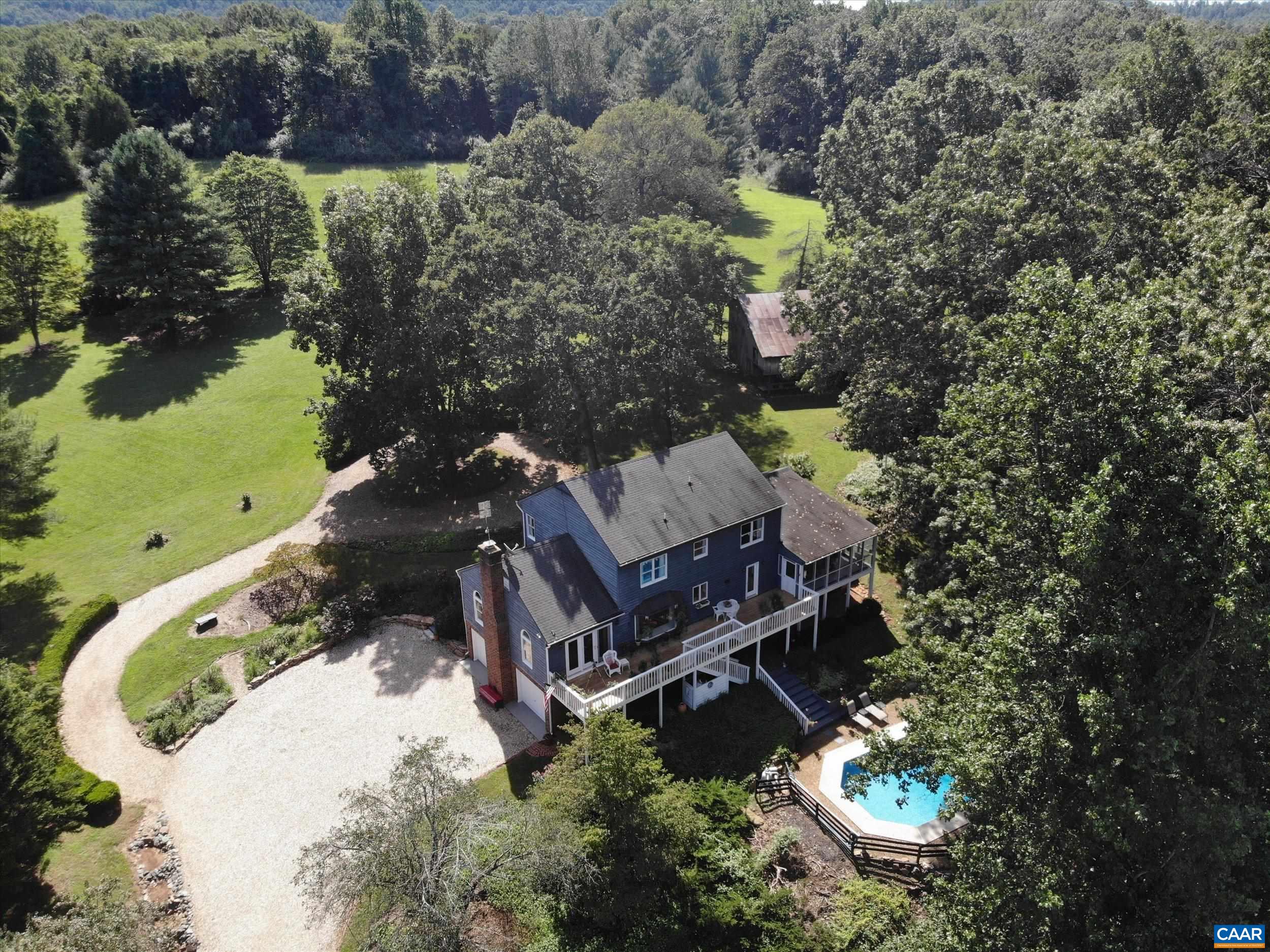 NEW PRICE in coveted Ivy neighborhood in the Murray district. Return to old country living - catching tadpoles and fireflies, going for a casual bike ride or Sunday stroll. Entertain guests in your in-ground pool or by projecting summer movies on the side of the rustic Barn. All this while enjoying modern conveniences of fiber internet and only 15 minutes to UVA and Western Albemarle schools! Professional prep work completed to plant a small fruit orchard. Fenced horse run on (on the side of property) makes horse boarding income possible. Opportunity to have llamas, horses, goats and/or other farm animals. No HOA. Traditional home w/ many modern updates including New D/W (2023), New Pool Plumbing (2023) & Custom Pool Cover (2022) & recent new Pool Liner, New Deck Stain & Paint (2023), New Exterior Paint (2023), New Screens for 3-Season Rm (2023). Updated Interior included - removed carpet & wallpaper (2021), entire inside repainted + Bathrooms & Kitchen recently renovated! 10.4 acres, although cleared portion easily manageable with ride-on lawn mower (can be included in sale). Aggressive price point allows room for expansion or conversion to open concept as you own one of the rare beauties in Western Albemarle! Open House 5/6/23!