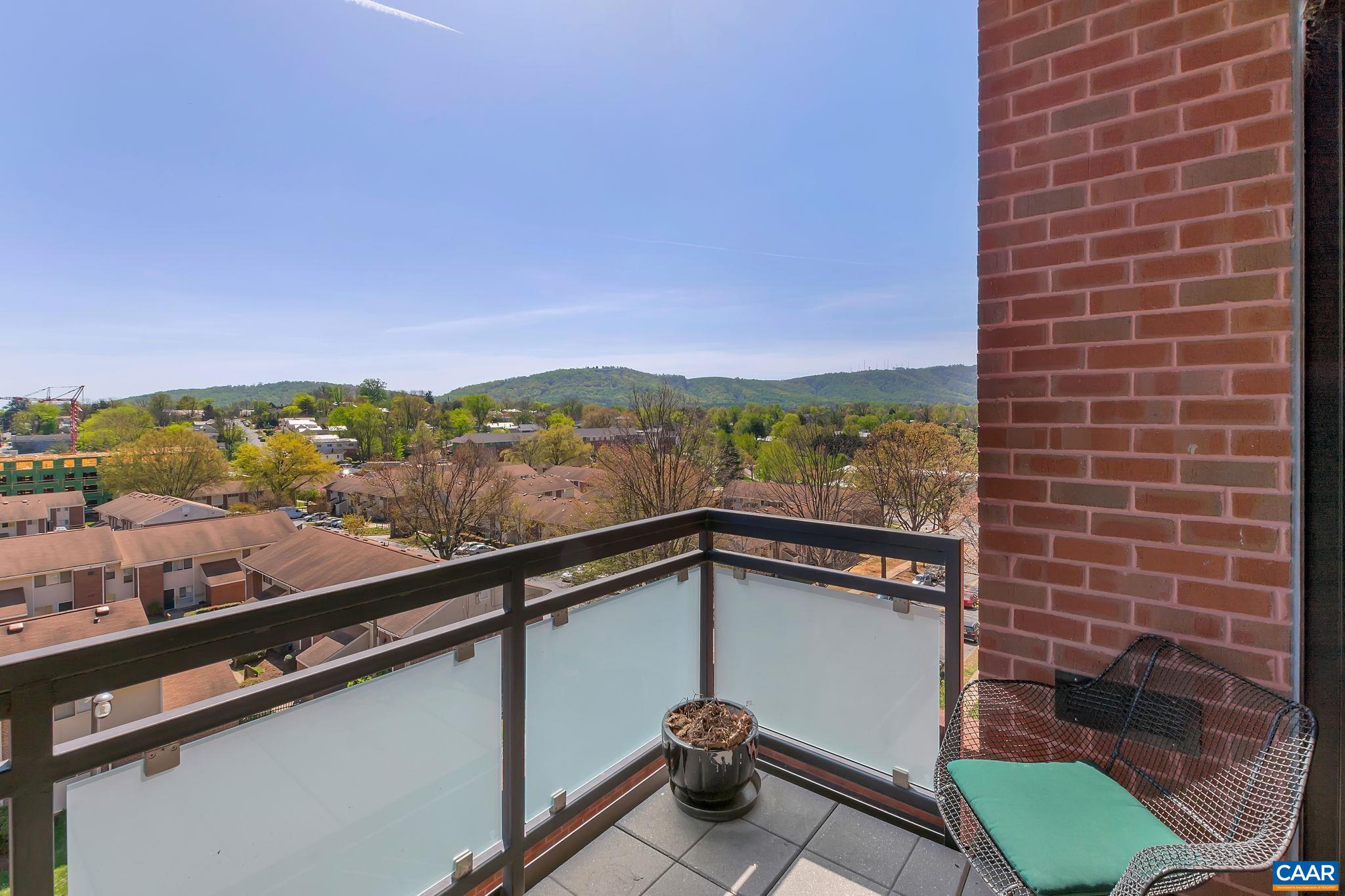 This lovely fifth floor condo is east facing with beautiful mountain views and just steps from the historic downtown mall, restaurants and other amenities. Originally designed as a 2-bedroom condo the owner omitted one bedroom to open up the floor plan making it ideal for entertaining and family gatherings. Custom built shelves adorn the living space. The kitchen area features a gas range, granite counters, pantry and recessed lights. This unit also features one deeded parking space very close to the elevator.