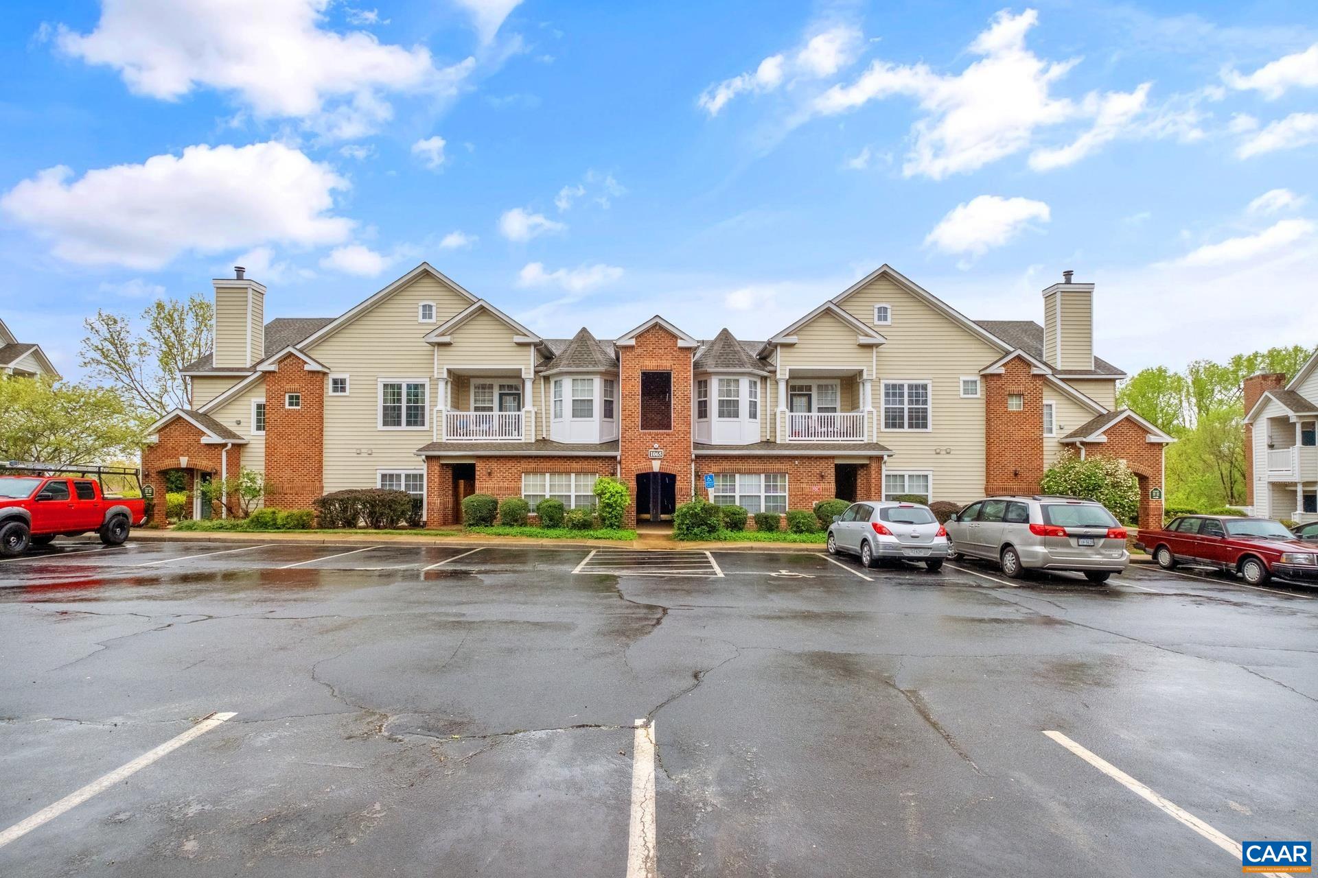 There is a reason the Carriage Hill community is so highly sought. The location affords beautiful mountain views, well maintained landscaping, and a thriving neighborhood with many amenities. This is a prime location making it convenient to Downtown, I-64 and Rt. 250. 1065 Weybridge Court is a 2 bed, 2 bath main offer main level living condo. Just a few of the community amenities include a community pool, gym, pickleball court, kiddie pool, tot lots, pitch and putt green, dog park, and more. As you enter the unit there is a ceramic tile foyer and carpeted common areas. The living and dining area has large windows which provide natural light giving this home a welcoming feel. The primary bedroom includes a large walk-in closet, and has its own bath. Both bedrooms have ceiling fans and sizable storage space. This condo is move-in ready.