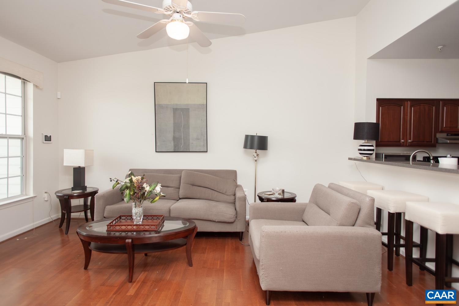 Cozy condo conveniently located to Rt 250, I-64, Downtown and UVA! Property offers an open floor plan that features dining area, kitchen with breakfast bar and stainless steel appliances, and living room with access to covered porch and storage area. Generous sized bedroom and ensuite bath with ceramic tile and tiled shower/oversized soaking tub. Freshly painted interior! The oversized garage offers space to park your car and storage. HOA includes exterior + area maintenance, water/sewer, trash, snow removal, clubhouse, fitness room, game room, media room, pool/hot tub, tennis court, putting greens, playground & more! Enjoy the extensive amenities and low maintenance living this property has to offer.