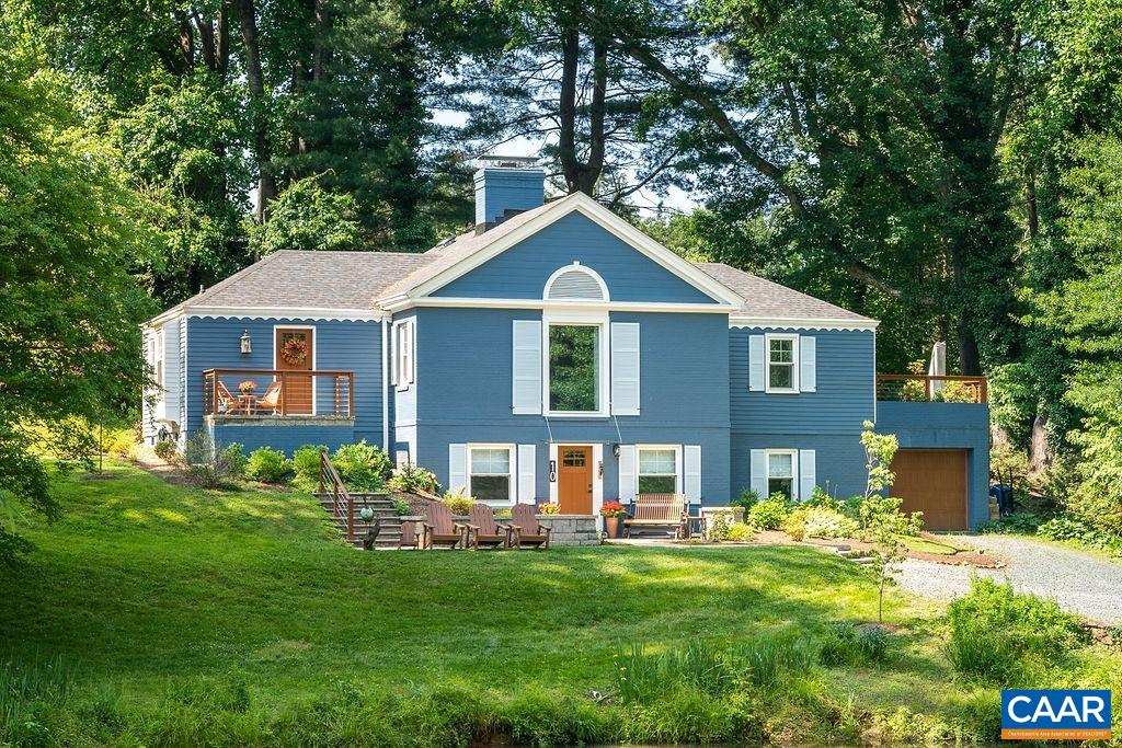 Incredible opportunity to live in one of the most coveted neighborhoods in Albemarle County while also owning a piece of history! This 1953 home was designed and built by well known architect, William Hale, a colleague of Milton Grigg, for his personal residence. The home has lovingly been updated while also preserving the history by the current owners. The hardwood floors throughout the main floor and beautiful crown molding speak to the original character of the home. Some modern upgrades include the kitchen opening to the dining room for seamless entertaining. Thoughtful kitchen renovations include new wood cabinets, quartz countertops, pantry storage, Bosch appliances, and versatile LVT flooring. The sliding glass door from the dining room allows for indoor-outdoor entertaining on the soapstone patio, while the spacious living room with wood burning fireplace offers cozy opportunities indoors. Each of the 3 bedrooms have ensuite baths, all updated within the last two years. The "unseen" fundamentals have also not been neglected with updates including new roof, HVAC, water heater, duct work, vapor barrier, and much more. Check out the improvements for a full list.