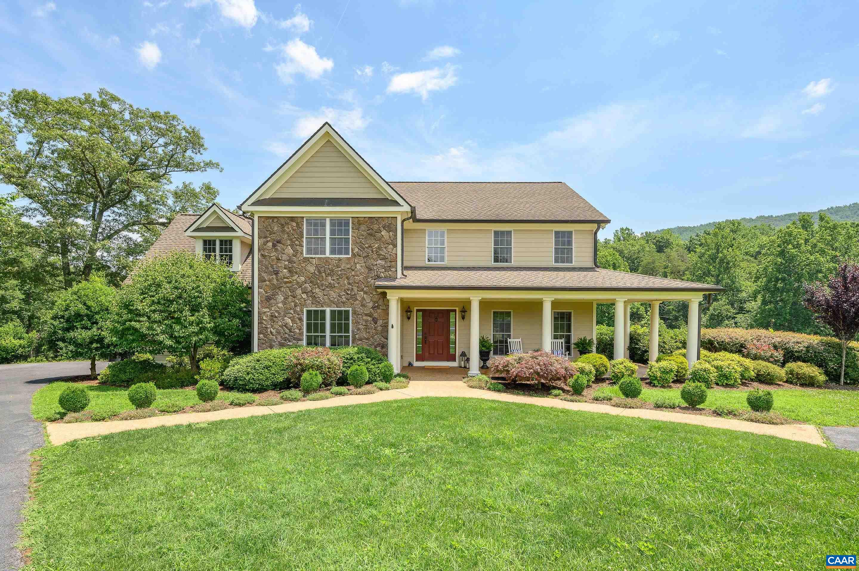 Fantastic property on nearly 6 acres in Retriever Run. Set against a mountain backdrop at the end of a cul-de-sac, this home offers a secluded setting bordering on a creek and woods. With a nearly level front/side yard and gently rolling back yard there is plenty of room for games and sports. Inside, this home offers an open floor plan with double-height foyer and 9' ceilings throughout the first floor. Wide-plank hardwood floors gleam throughout the first and second levels. The large great room features a marble-surround gas fireplace with custom-built mantel flanked by built-ins. Beautiful kitchen with inset painted wood cabinets, latch hardware, granite countertops, stainless steel appliances (2018) including DACOR gas range, island, morning room for casual meals, large pantry, and raised bar is a dream for entertaining. Upstairs the owner's suite with lovely trim details, many windows, ensuite bathroom (2020), and large walk-in closet is an oasis. 3 add'l bedrooms share a spacious hall bathroom (2019) with dual sink vanity. In the walk-out basement find a large rec room, additional game/gym/office space, 5th bedroom, full bathroom, and large unfinished storage space with additional W/D hookup. Murray Elem and Western Alb HS!
