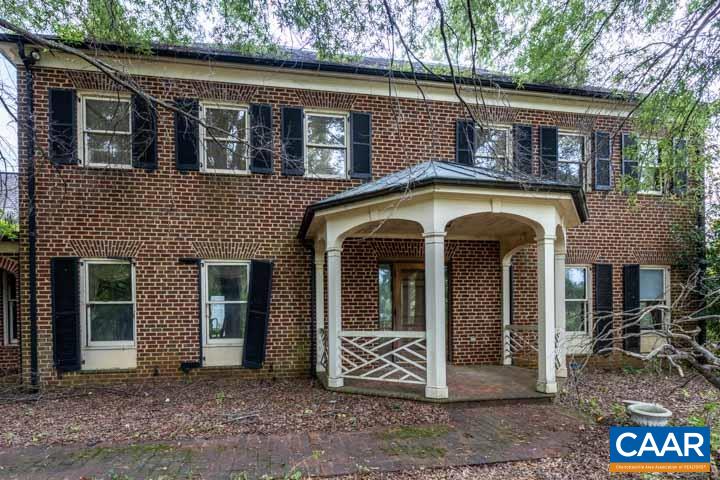 Don't miss this Amazing Fixer Upper, in Ivy on over 11 acres with over 5100 SF of living space, a basement, 2 car garage and garage apartment. The owner was unable to take care of this home for many years and so it is sold "AS IS". The sale Includes an extra attached building lot . The home was originally built with top quality construction and thoughtful design. The first floor has tall ceilings, with custom oak trim throughout-including Oak doors and floors. The Large Sun Room needs work but is huge and bright! You will love the huge stone fireplace. A bonus is the walk up unfinished attic for storage and a main level home office with its own entrance. Located in the Ivy area with Western Albemarle Schools , this one is ready for a remodel!