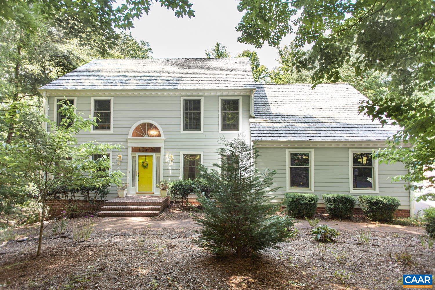 Beautifully updated home on over 5, partially wooded acres in desirable Waverly neighborhood! Find thoughtful features throughout from built-in shelving & in-floor electrical outlets to the art sink in the basement. Main level is comprised of a home office, formal living room, large dining room, half bath & cozy family room with wood burning fireplace, skylights, & access to screen porch. The fully remodeled kitchen includes a granite center island, soft close cabinets, dual ovens, & induction cooktop. The second level showcases new hardwood floors throughout. Two bedrooms feature large walk-in closets while a third has vaulted ceilings & dual closets. Primary bedroom offers vaulted ceilings, tons of closet space & private, spa-like bath with dual vanities, glass shower, & heated floor. The partially finished basement is perfect for relaxation & play with unfinished space for storage. Tranquil, shady yard is private & partially fenced with 8-foot deer fencing. Trex deck extends into the screened porch with speakers & a gas line directly to a buried tank for your grill. Additional features include whole house generator, dual water heaters, & Hardie Plank siding. Located close to vineyards, local farms, & a short drive to Crozet.
