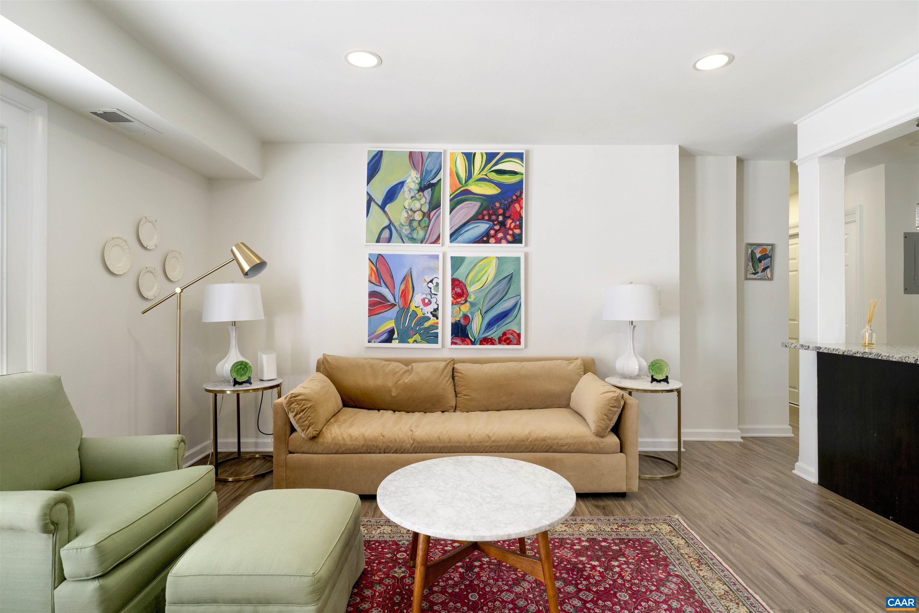 Beautifully updated, light filled condo in coveted 1800 Jefferson Park Ave. Just minutes from UVA and downtown, this first floor unit boasts direct private access from the pool-side parking lot...no stairs or elevator required! Entrance includes private fenced-in patio. Condo is being sold FULLY FURNISHED, with certain personal items and artwork withheld (see documents or call/text agent). Perfect for someone looking for a turn-key property; great investment opportunity! HVAC replaced 2022; brand new refrigerator; high-end appliances; granite counters. This is the perfect condo close to campus!