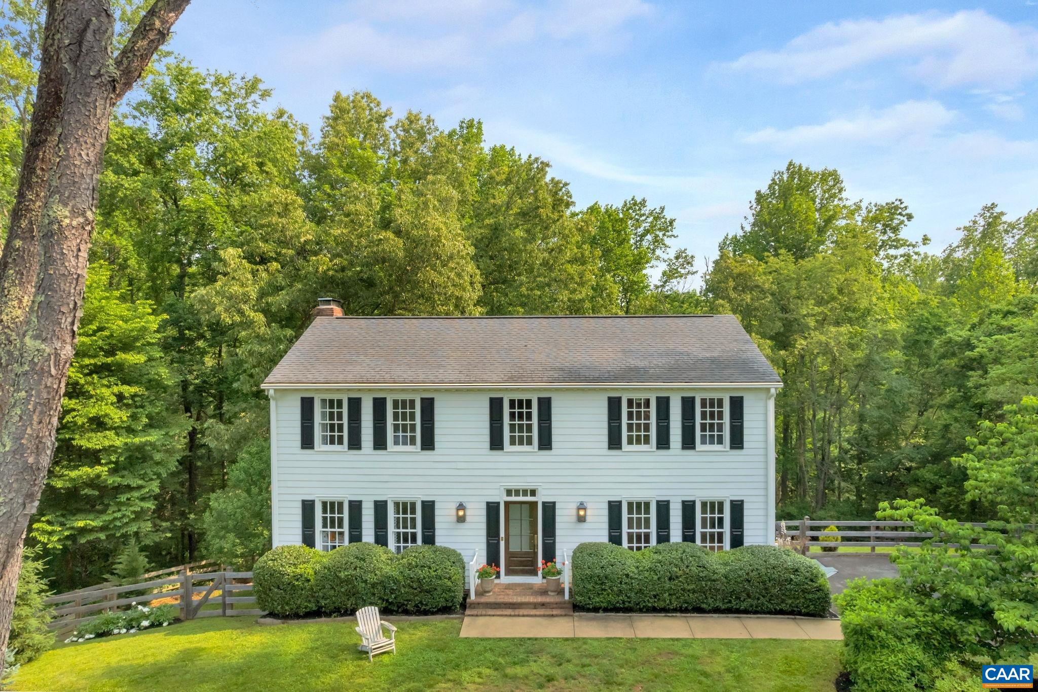 This very special property in West Leigh, a popular Ivy neighborhood, is completely renovated with every detail planned to perfection. The functional floorplan provides a great layout for everyday living and entertaining with a gourmet kitchen opening up to a family room with a wood burning fireplace and custom built-in bookcases. The interior filled with natural light features a fully updated kitchen & bathrooms, all new lighting, hardware, plantation shutters and a 2nd floor stackable washer & dryer for added convenience. Cozy up in front of one of the two wood burning fireplaces or sit on the screened-in porch. Both spots perfect for watching sports, movie night or reading a book. A walkout basement rec room adds additional living space. Updated HVAC & tankless water heater. Mature landscaping, fully fenced yard w/ an attractive garden house including a private gated trailhead to “Narnia," miles of beautifully maintained trails connecting West Leigh, Holkham, West Woods among other neighborhoods.  Located at the end of a quiet cul-de-sac in the Ivy Elementary school district. Not to mention neighborhood access to private Clover Lake. A home like this does not come along very often! Come see for yourself!
