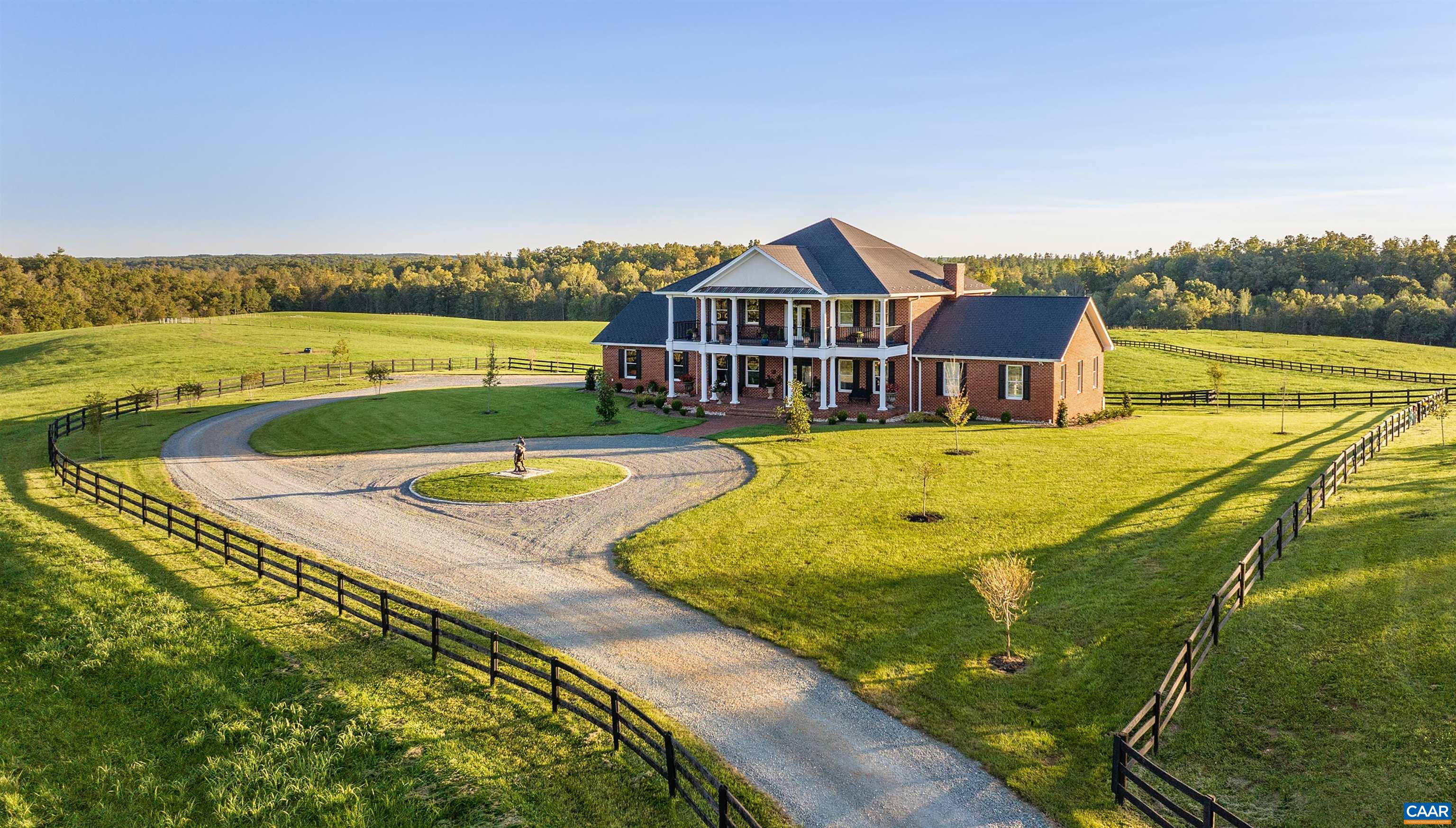 Gone Away Farm - a pristine & stately 153.85 acre rural homestead nestled just 6 miles southeast of the City of Charlottesville, and just a few short minutes from several Albemarle County landmarks including Thomas Jefferson's Monticello, James Monroe's Highland and the Michie Tavern. The centerpiece of this fine property is a two story custom brick residence with over 7,300 finished sq.ft. of living space, 4 bedrooms, 5 full baths & 2 half baths, offering spacious & comfortable living spaces filled with natural light, as well as top quality craftsmanship & finishes throughout. Some of the home's many features include: a stunning, fully loaded chef's kitchen with stainless steel appliances; huge sun room with excellent views; main-level primary suite; breathtaking second story balcony; massive finished terrace level to spread out; and so much more! The land is well manicured with fenced pasture, bold woodlands & 2 streams, and is is further complimented by a 6,000 sq.ft. barn, fenced garden & chicken coop. Ideal for horses, livestock or other agricultural pursuits, the possibilities & opportunities here for luxurious country living are innumerable. No conservation easement.