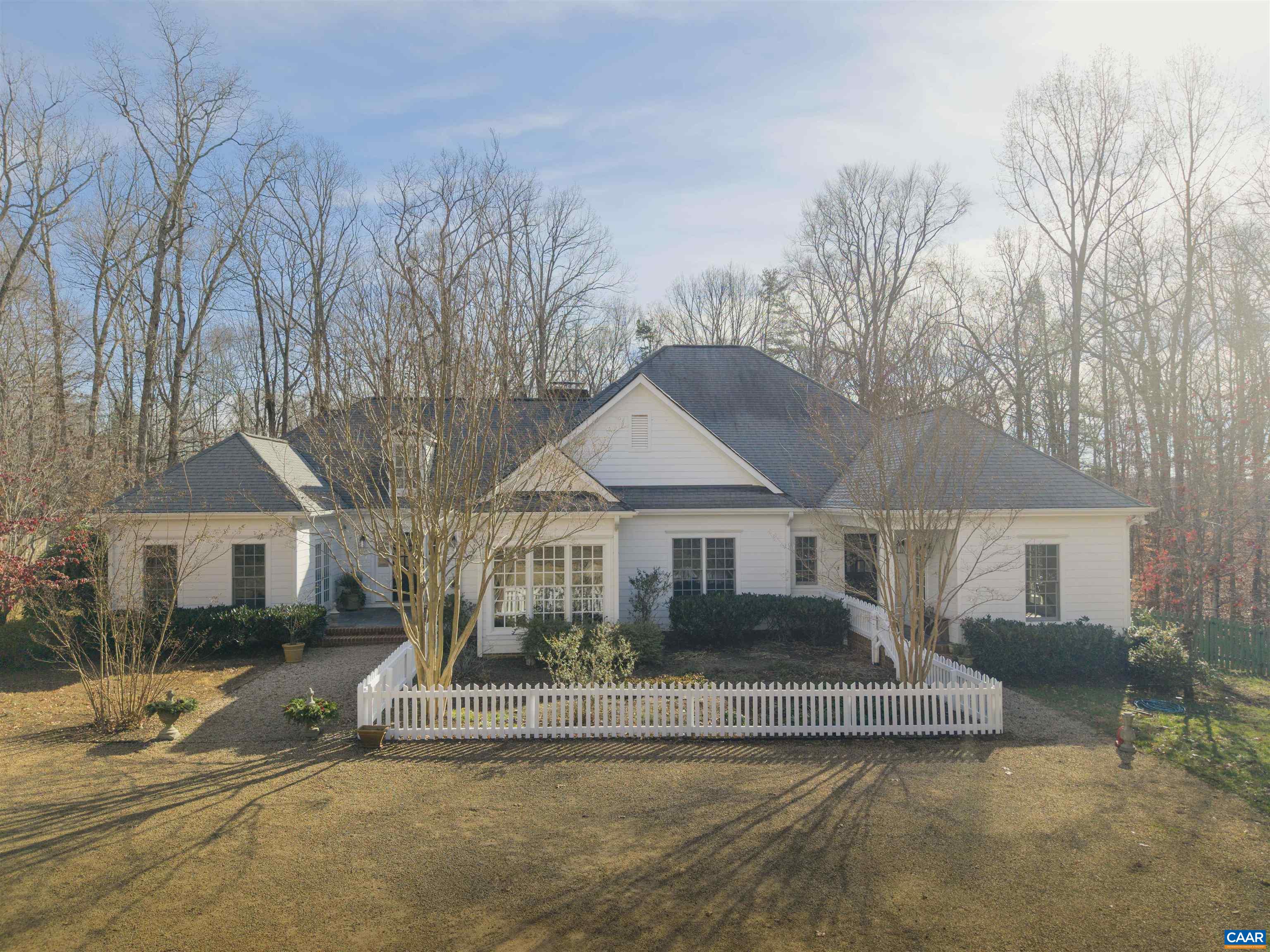 Enchanting custom home on 5 acres located in a beautiful part of Albemarle County-minutes to Keswick Hall. Exceptional details define this striking residence.  One level living featuring flexible space including a newly renovated kitchen, Great Room with vaulted ceilings/skylights and gas fireplace, dining area and keeping room. Added highlights include a built-in bar, large laundry & mudroom with radiant heated floors, generous screened porch with outdoor fireplace and a Generac whole house generator. Many additional improvements and system upgrades. A level backyard with a gorgeous fully renovated pool pavilion makes this home perfect for entertaining. Truly a unique offering in the heart of Keswick.