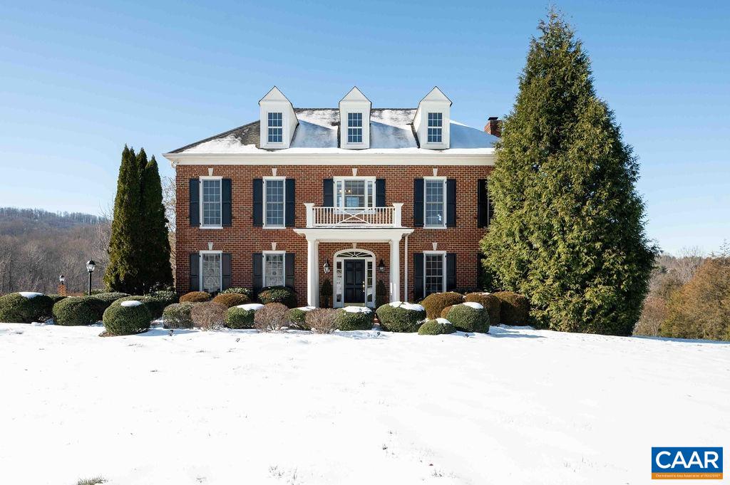 Elegant, all brick Georgian located in The Rocks, one of Ivy's most sought-after neighborhoods, popular for its walkability, pastoral beauty, award-winning schools and unbeatable convenience. Privately tucked in the back of the neighborhood, this home's peaceful cul-de-sac location offers gorgeous, unobstructed views of rolling hills, pasture, woods and the majestic Blue Ridge! The masterfully-tiered yard offers level, sweeping front and back lawns - ideal for entertaining and play. Premium finishes, abundant natural light, 9’ ceilings and thoughtful floor plan combine to offer relaxed sophistication and exceptional functionality. 3 finished levels, 4 bedrooms and 2 dedicated offices. The sunny, well-appointed kitchen features a huge granite island, spacious breakfast area, custom cabinets and stainless appliances - including 6 burner gas range and double ovens. Upstairs, you’ll love the deluxe primary suite w/ sitting area, 2 walk-in closets and luxurious bath overlooking the views. Walk-out terrace level offers wonderful options for recreation, exercise, work, media and more! Firefly high-speed fiber internet confirmed for install in 2025!