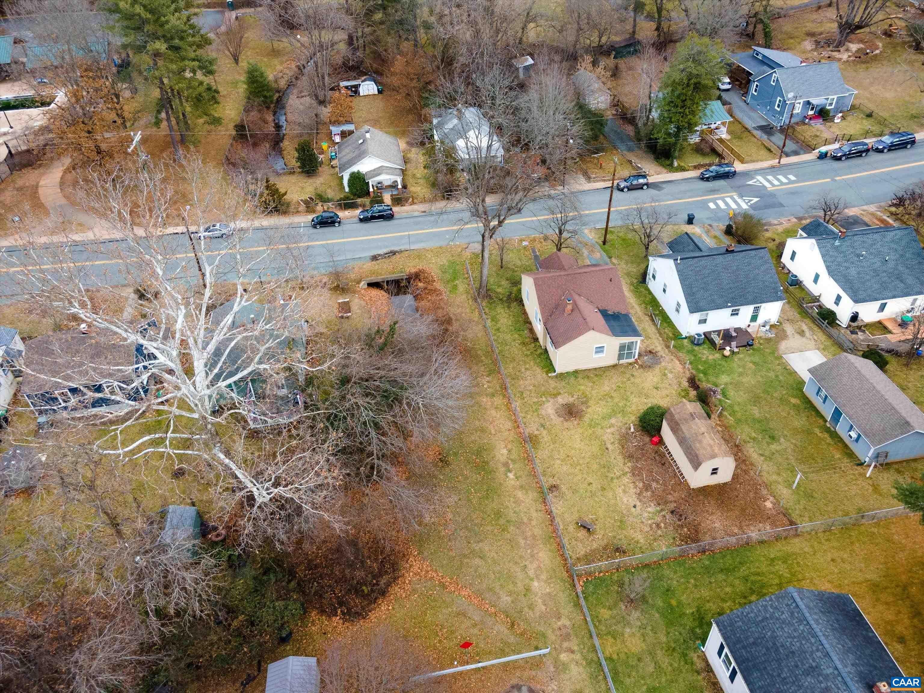 BARGAIN RARE OPPORTUNTY-  Cville City cottage plus build  adu or Tiny Houses or units  & furnish them  for total 4 homes on lot with new zoning Charlottesville zoning law. in Woolen Mills popular neighborhood  near downtown & Belmont. REDUCED  $150K to $349,900.   Live  cottage & 3 units  rent as income in rear yard.   Access from street behind to rear of lot if desire  Call city zoning re latest on new city zoning. Reduced from $499,900.