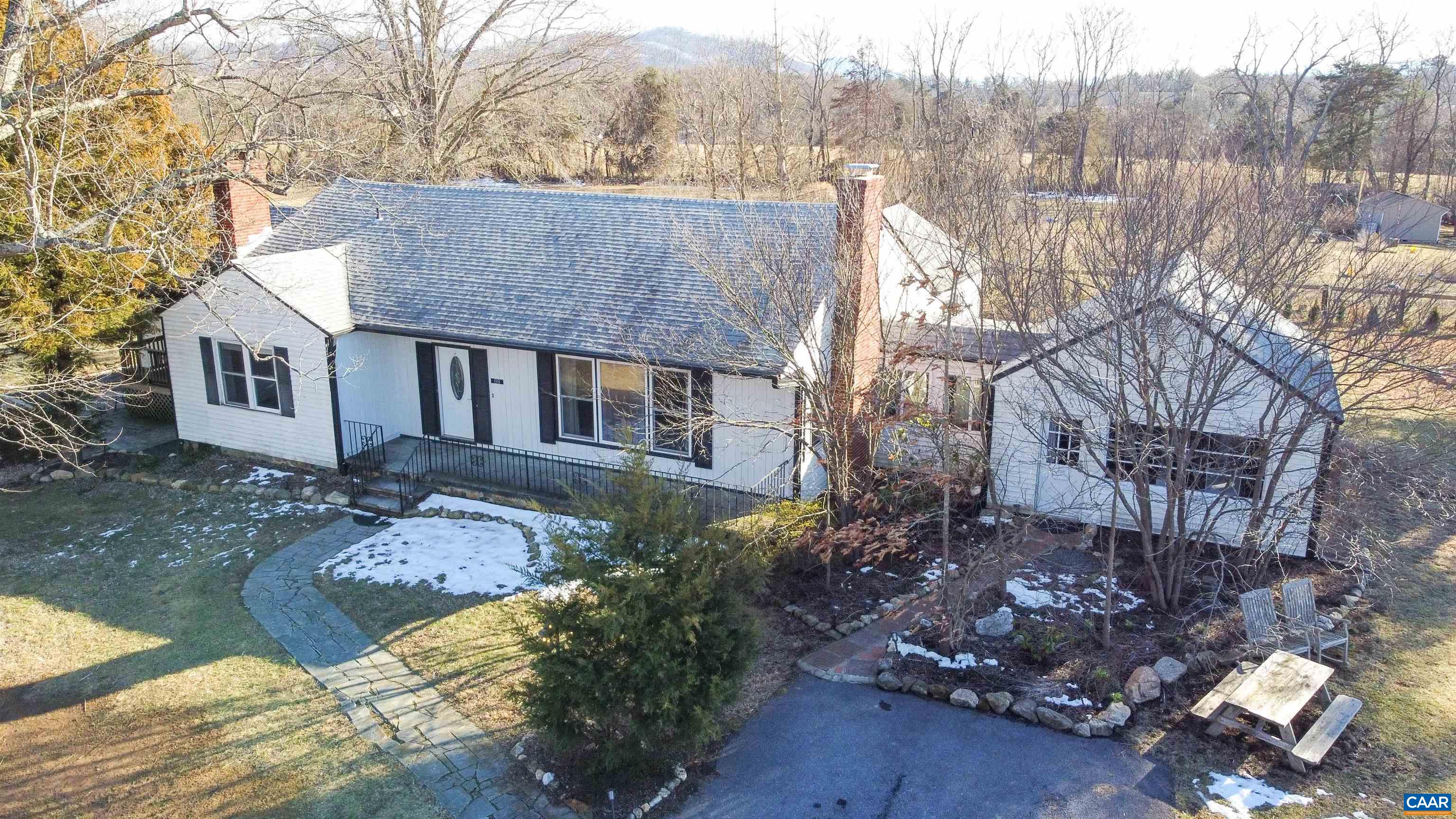 Opportunity knocks with this fully furnished, turn-key investment property. This extraordinary Afton estate sits right on the famous Nelson 151 wine and Brew Trail, featuring a 5-bedroom, 4-bath main house, a 2-car garage, a renovated guest barn, guest cottage, and a private office/studio space steps from the main house. The property also boasts a wet bar building with RV hookups and chicken coop.  Featuring 5 (+1 RV rental space) income-producing units on 1.8 acres, this property generates over $125k+ annually. Ideal for investors or owner-occupiers seeking supplemental income. Scenic mountain views, proximity to local wineries/breweries, and flexible layouts. Don’t miss this rare opportunity for a high-performing rental portfolio in a premier tourist destination!