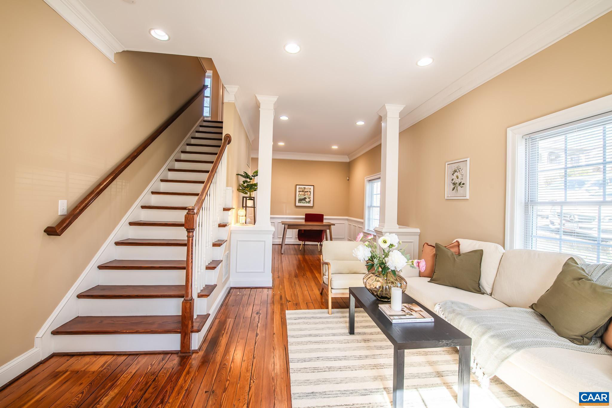 Unique Farm house styled home in prime location just ~1 mile from the University of Virginia Hospital, Downtown Mall, or Wegman's shopping center! Featuring original hardwood floors and an expansive floorpan, this home has everything you need to make your own. This home was thoughtfully renovated in 2005 and all major systems were replaced and updated. There is a bright and open living room adjacent to the kitchen and a bedroom and full bathroom on the first floor, along with three additional bedrooms upstairs. The bedroom on the main level could also be utilized as a home office/study or as a main floor primary with attached full bathroom.