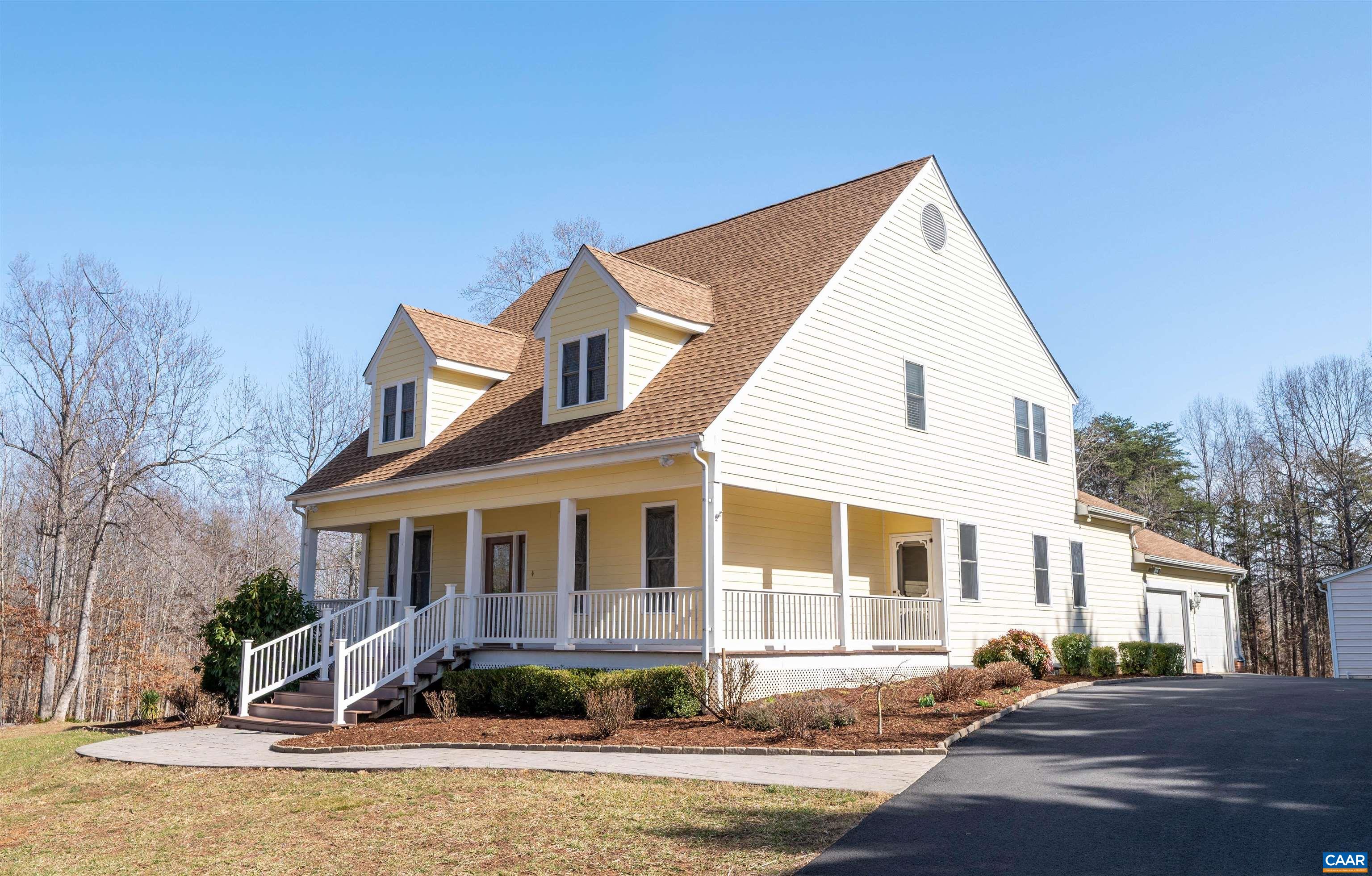 Handsome Cape Cod style house built in 2001 with 2,838 finished square feet (all above grade), 4/5 bedrooms and 2.5 bathrooms. Nicely sited on three+ acres, the main level features a new kitchen with stainless steel appliances, quartz countertops and a large island, a spacious dining area and a great room that opens onto a large covered rear porch overlooking the private backyard. Also located on the main floor is the owners' suite w/ walk-in closet & double vanities, a den/office, a guest half-bath and the laundry. The second floor includes four bedrooms, hall bath and four walk-in closets! The walk-up attic offers excellent storage potential. Other noteworthy features include an attached 2-car garage with heat & window A/C, an oversized, insulated workshop/3rd garage w/ mini split HVAC, and a newer shed. The owners have made many upgrades since they took ownership in 2017. Interior improvements: LVP flooring in all the bedrooms, upgraded baths and interior trim, and new custom window valances throughout. Newer washer, dryer and water heater.  Exterior improvements: new roof (2020), new asphalt driveway (2023), new dormers (2024), fenced garden area and extensive tree work &landscaping. RESCHEDULED OPEN HOUSE Sun 3/30 1:30-4pm.