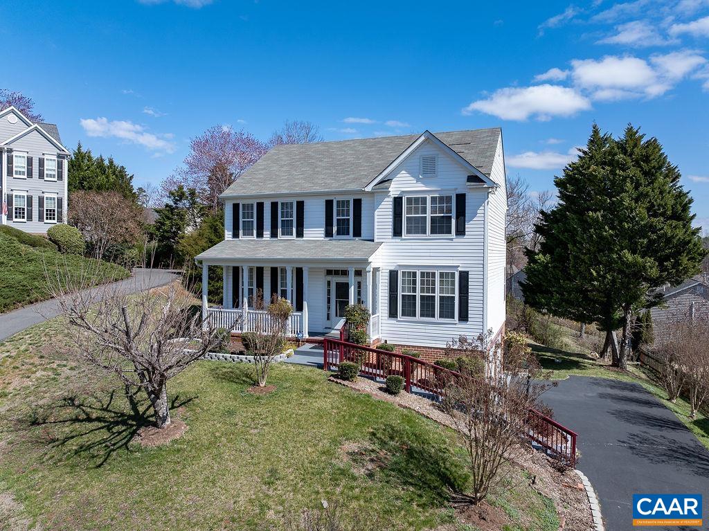 OPEN HOUSE APRIL 5th from 10:00 to 12:00 AND APRIL 6TH FROM 1:00 P.M. TO 3:00 P.M.   Ready to live on the out skirts of Charlottesville and be so convenient to everything?  5th Street Station is minutes away.  Look at Carters Mountain from your back deck!  This is the house for you!   Main level offers hardwood floors, formal living and dining rooms, family room with a gas log fireplace and eat in kitchen.   4 bedrooms upstairs.  Basement offers a rec room and bathroom.   There is a closet, so making this a 5th bedroom is an option.   2-Car attached garage.  Covered front porch and large back deck for additional gatherings.