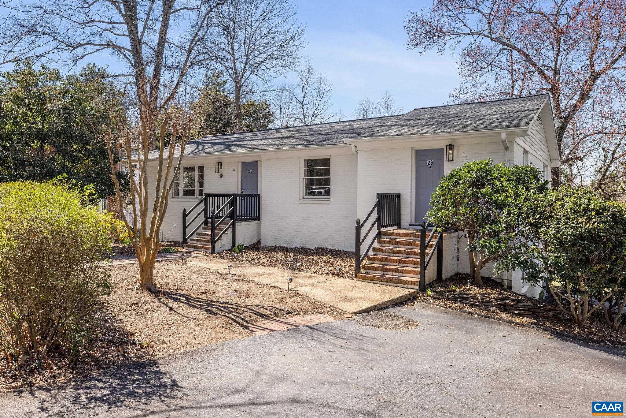 Set on over half an acre on one of UVA’s most sought-after streets, 26 University Circle offers location, flexibility, and income potential. The main level features a spacious 3-bedroom, 2-bathroom unit with a fantastic back deck overlooking the private backyard. Below are two 1-bedroom/1-bath apartments that generate reliable rental income. Live upstairs and rent the lower levels, lease all three, or reimagine the entire property to suit your vision.   There’s ample off-street parking, and the home has benefited from thoughtful maintenance and upgrades within the last five years—inside and out. Exterior improvements include extensive tree work, full exterior painting (2021), and back deck power washing and staining (2025). Inside, the upstairs unit was refreshed with new white oak flooring, stainless steel appliances, updated lighting, and a remodeled hall bathroom—all in 2021. Apt B received a new ducted HVAC system with air scrubbers (2021), fresh paint, lighting, a new vanity, and updated flooring (2023). Apt C also received fresh paint and a new HVAC system in 2021. Floors plans reflect the upper level only.   A rare opportunity in an unbeatable location near the University. Zoned RA