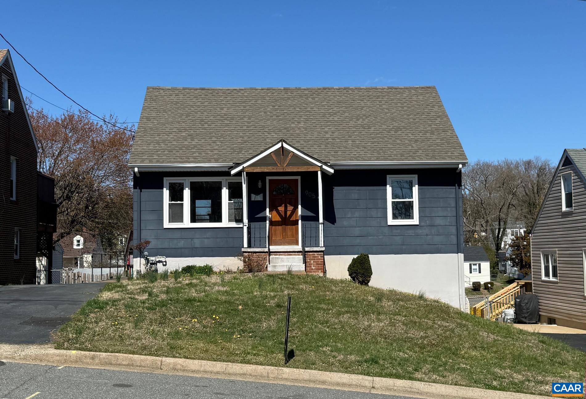 OPEN HOUSE SATURDAY MAY 3 FROM 1 TO 3 PM!!!  Say hello to your new home! This renovated Belmont circa 1959 cottage combines the charm of an older home with today's modern conveniences. Main level has living area open to updated kitchen and breakfast area, two bedrooms and full bath. Upstairs is the primary bedroom, full bath with large walk-in tile shower, and living area or 4th bedroom. Walk-out basement level has finished space (could be rec room, family room or office) with windows/exterior door, and unfinished space containing mechanical/utilities, laundry and storage area. Rear deck overlooks the open fenced back yard with storage shed and neighborhood views from the home's elevated setting. Paved driveway and on street parking. Convenient location, easy access to the Downtown Mall, I-64, Fifth Street Station, UVA Health.
