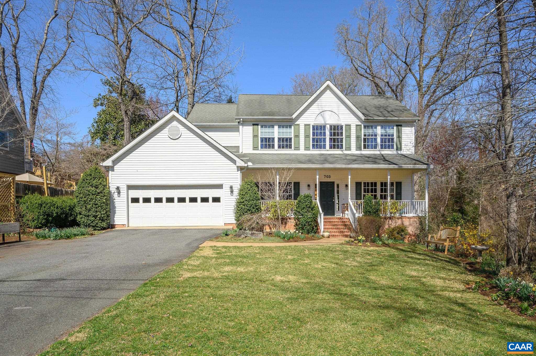 Centrally located, this beautiful city home is move-in ready. Walk or bike the easy mile to the Historic Downtown Mall, YMCA in McIntire Park, access to the Rivanna Trail, John Warner Parkway and Northeast Park. Two miles to Grounds, UVA Hospital, Sentara MJH, Whole Foods. Inviting foyer, cozy living room, dining room. The family room opens to the back deck and enjoys a two sided fireplace to the breakfast room and kitchen. A rarity in the city, the double garage enjoys easy access to the kitchen. The second level boasts four bedrooms, including a spacious ensuite primary bedroom with double vanity and oversized tile shower, plus walk-in closet. The expansive terrace level offers high ceiling, multiple areas for recreation, crafts, work out space, den with fireplace, double French door to flagstone terrace and fully fenced back yard, full bath, laundry and abundant storage. The full front porch, large back deck, extensive mature landscaping in the front and back create serene outdoor living spaces.