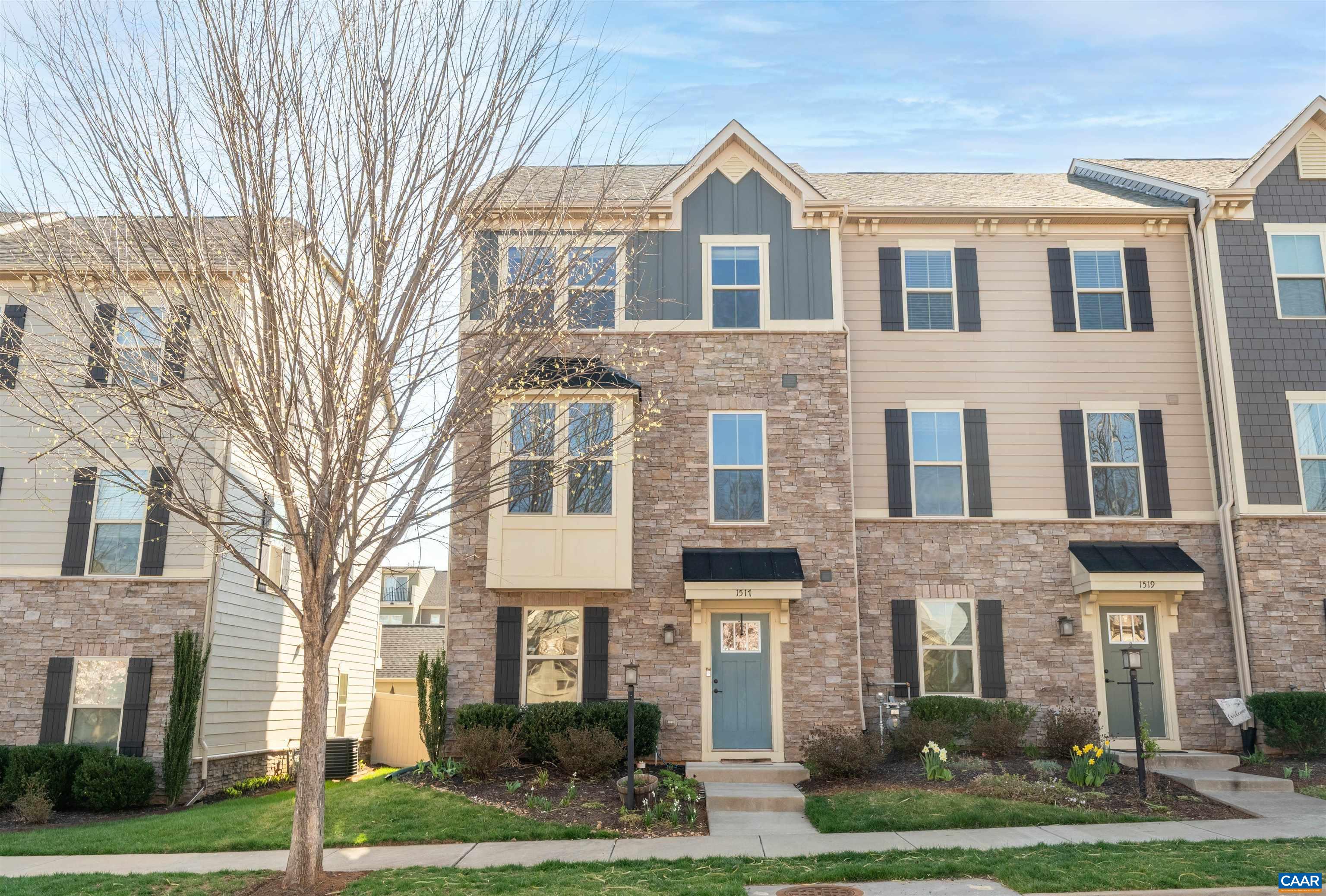 This stunning townhome stands out because it has a beautifully landscaped fenced yard—a true gem in townhome living! Located in an unbeatable spot near UVA, downtown and Martha Jefferson, this home offers modern upgrades, spacious interiors, and exceptional outdoor space. Step inside to a sunlit main level featuring an open-concept design, where the spacious kitchen flows seamlessly into the great room and dining area—ideal for both everyday living and entertaining. Upstairs, the luxurious primary suite boasts a spa-like ensuite bath and a generous walk-in closet, accompanied by a second large bedroom and an additional full bath. The third bedroom, situated on the top level, offers privacy and direct access to the stunning rooftop terrace. The lower level is a true highlight, with a versatile basement space that opens directly to the fenced yard—a private retreat perfect for pets, gardening, or simply unwinding outdoors. The previous owners have thoughtfully designed this space into a serene, enjoyable oasis.  Additional features include a two-car detached garage and access to the incredible Cascadia community amenities, including walking trails, garden spaces, a clubhouse, a pool, and multiple playgrounds.