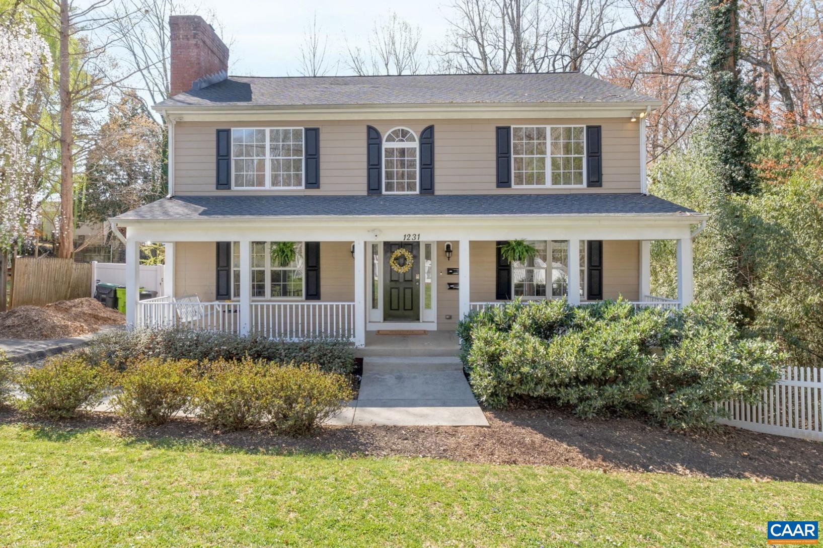 This is the CHARLOTTESVILLE HOME you've been waiting for; CLOSE TO EVERYTHING with lots of room to spread out! Welcome home to 5 bedrooms & 3.5 Bathrooms including a MAIN LEVEL PRIMARY SUITE with walk-in closet updated bath and office/sitting room. In addition to the convenience of this primary bedroom on the main level, there is an updated kitchen, dining space with built-ins, painted brick fireplace, & full walk-out basement with rec room & full bath. Don't forget the PICTURESQUE FRONT PORCH, deck off the primary, SCREENED PORCH & fully fenced backyard! The Kitchen has GRANITE COUNTERTOPS, a marble backsplash, STAINLESS STEEL APPLIANCES, an island for extra storage, and easy access to the screened porch & backyard! Basement can be an IN-LAW SUITE OR income generating, SELF-CONTAINED APARTMENT with separate entrance. Don't miss the established FRUIT TREES & perennials or the opportunity for chickens within city limits. Sellers have loved living here and completed many home improvements including NEW CARPET AND REFINISHED HARDWOOD FLOORS to make it move-in ready for you!