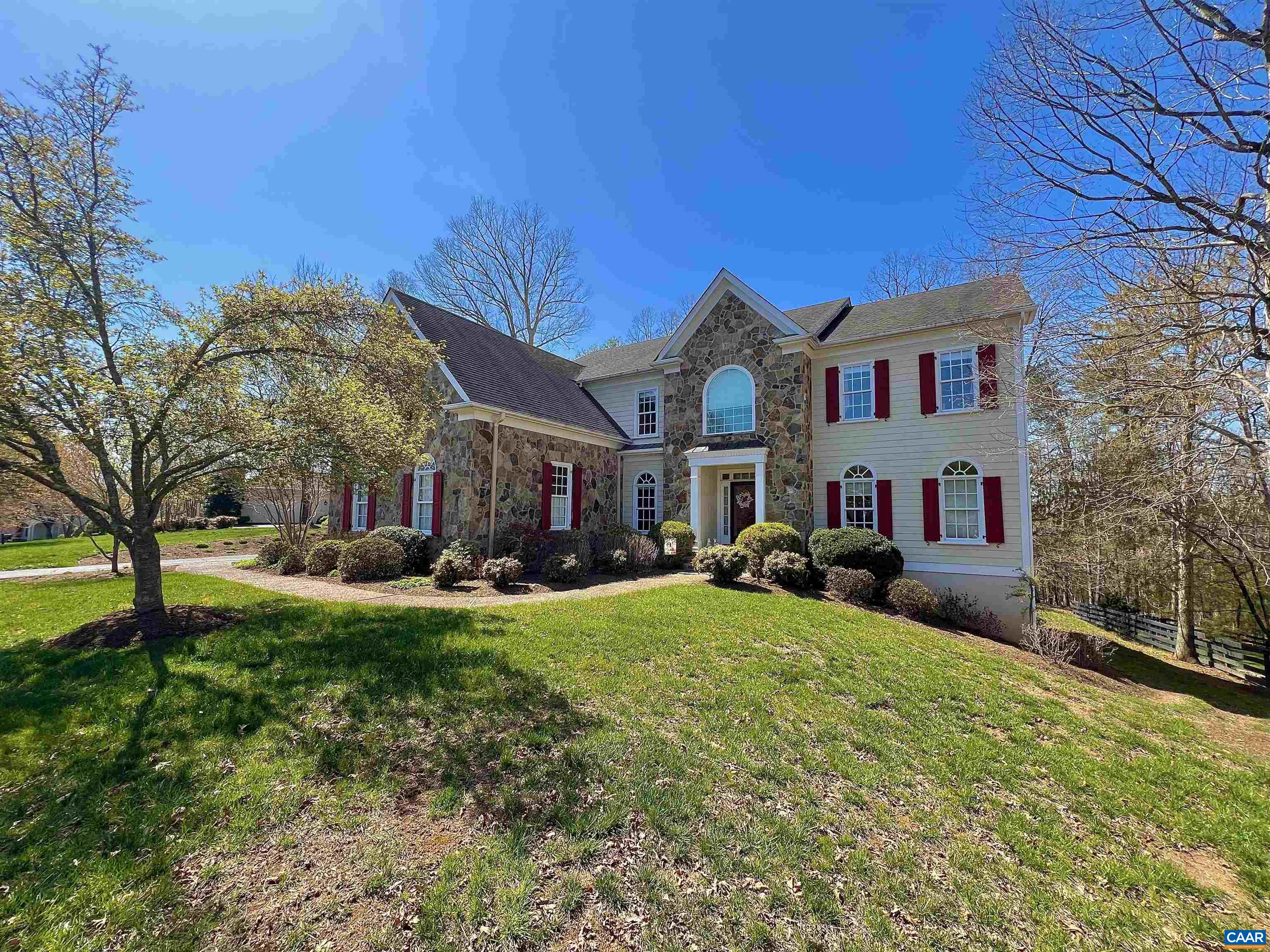 Discover this exquisite 5-bedroom, 4-bath home nestled on a private, wooded lot in the prestigious Scottish Homes section of Glenmore Country Club. This beautifully designed residence offers an open floor plan, seamlessly blending spacious living areas perfect for both relaxation & entertainment. The exterior entry features a custom stone veneer WHICH extends around the oversized garage with golf cart bay, adding timeless curb appeal. Large rooms with vaulted ceilings, arched windows and half round toppers enhance the airy ambiance, while expansive windows invite natural light and showcase the serene wooded views. Skylights in the primary bath, office, and living room further brighten the home. Culinary enthusiasts will appreciate the large gourmet eat-in kitchen, complete w/ stainless steel appliances & ample space for gatherings. For entertainment, the home boasts a dedicated media room, perfect for movie nights. A generously sized recreation area provides endless possibilities for family gatherings, an in-law/Nanny suite. Large enclosed screened porch access as well. 3D and video tour links available by request.