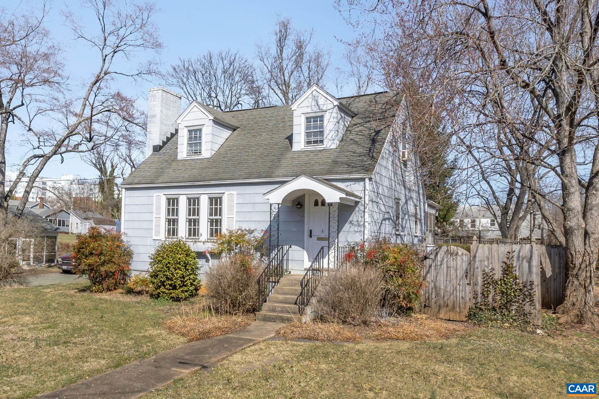 Offered with the adjacent building lot for for a total of 0.32 acres & nestled atop a sunny knoll in the highly sought-after Fifeville neighborhood, this delightful 3-bedroom, 2-bath Cape Cod blends timeless character with exciting potential. Just a short jaunt to the University of Virginia, the vibrant Downtown Mall, & an array of charming shops & restaurants, this corner-lot gem offers the best of Charlottesville living. Surrounded by mature trees, the home features original hardwood floors, a cozy fireplace in the living room, & a freshly painted interior that feels both bright & welcoming. The eat-in kitchen nook & sun-drenched enclosed rear porch provide perfect spots for morning coffee or quiet reading. Downstairs, you’ll find a spacious walkout basement with its own entrance—partially finished & brimming with opportunity. Whether you envision a guest suite, home office, or rental unit, there’s plenty of room to make it your own. Architectural plans for an elegant renovation are included, helping to bring your dream home—or investment property—to life. Bonus features include off-street parking & generous basement storage. The property is zoned R-B & each parcel is available for multi family development of 6 to 12 units