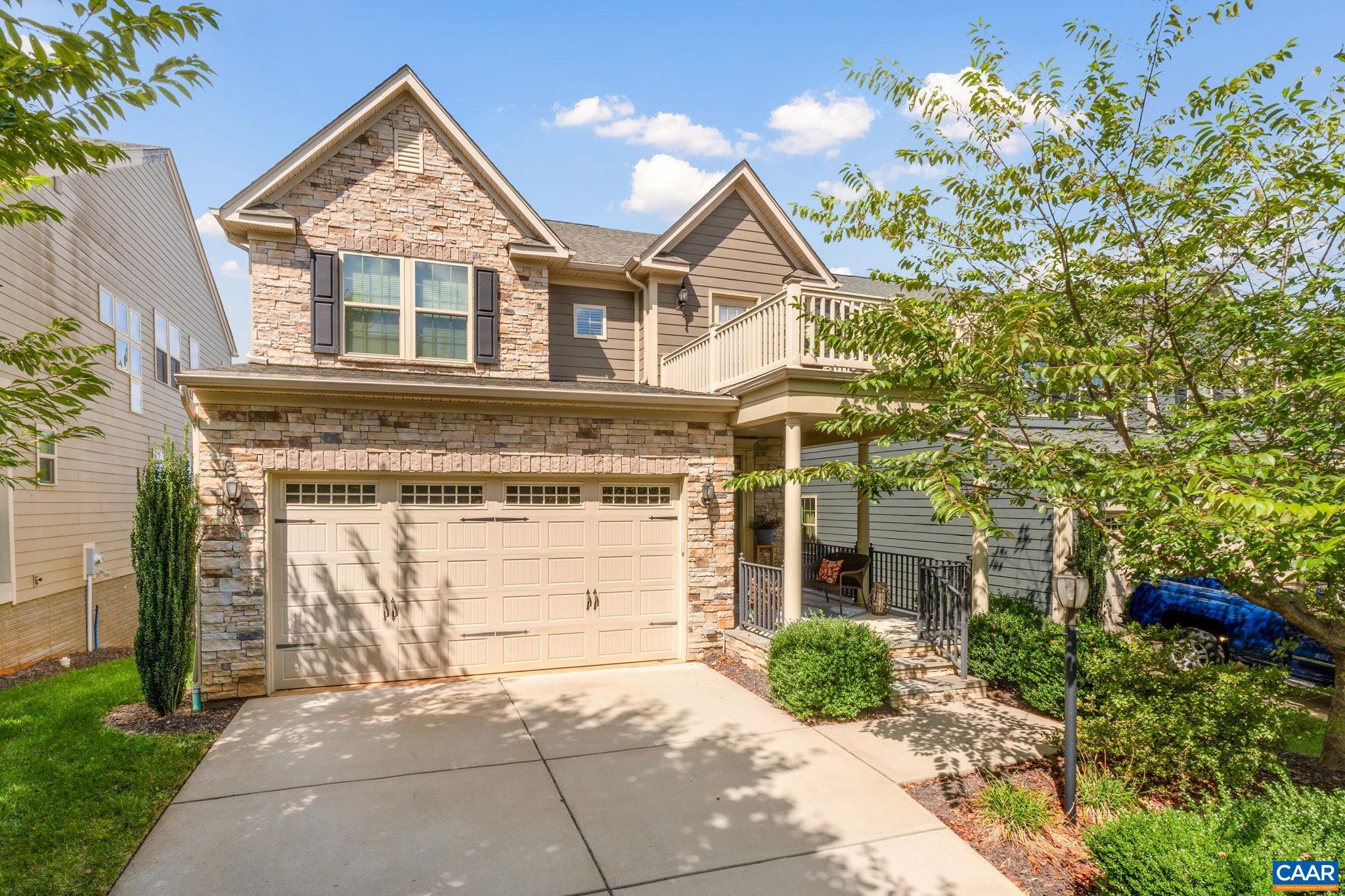 OPEN HOUSE SUNDAY 5/4 from 1-3. Imagine waking up each morning to the breathtaking panoramic mountain views surrounding this exquisite home, with every upgrade offered. Spacious deck overlooks a stunning natural landscape, a serene oasis, take in the majesty of the rolling hills and distant peaks. Classic Craftsman design, with stacked stone exterior and double front porches, exudes an inviting warmth that beckons you inside. The open, flowing floor plan immediately impresses, seamlessly connecting the gourmet, chef-inspired kitchen, perfect for effortless entertaining, to the airy living spaces. Dedicated home office provides flexibility to work from home, fiber optic internet ensures lightning-fast connectivity. Sumptuous primary suite, complete with spa-like en-suite bath, or venture downstairs to the terrace level, which boasts a full bath, recreation room, family room, and bonus space - ideal for guests, in-laws, or teenagers seeking their own private domain. Step outside to the terrace patio, where the swing invites you to relax and savor the commanding views. This home offers the perfect balance of sophistication and comfort, a warm, inviting atmosphere that will make you feel right at home. HOA takes care of yard