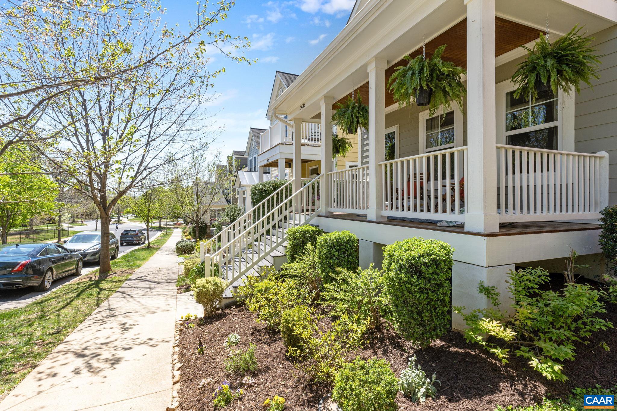 COME SIT A WHILE ON THIS EXPANSIVE & WELCOMING FRONT PORCH. Enjoy quite time with your favorite beverage & meet the neighbors as they bring their pets to the popular Dog Park nearby. Welcome HOME to this beautiful, energy efficient, solidly built Wendel Gibson beauty with full Solar Panel system in the desirable Belvedere Community.  Enjoy the rear private patio & experience the convenience of living close to all your favorite amenities JUST MINUTES from Downtown C'ville & UVA Hospital.  Priced well BELOW assessed value!!! This well-built 2x6 construction home offers 3 Bedrooms & 2.5 Baths w/upstairs laundry, plus hardwood floors on the full 1st level & gorgeous Built-In Library bookshelves. Offering an open floor plan with a huge Living Room & Dining Room that melds with the Granite & Stainless Kitchen & Breakfast area leading to the rear private patio. Detached 2 car rear-load garage. This home feels nearly new so just move in and unpack! Solar Panels are owned & convey with the purchase - average electric bill has been $13 per month! Tankless water heater, too! HOA covers Ting internet, trash, recycling, landscaping, pet & tot lot parks, snow & leaf removal & so much more! Come see & experience all that Belvedere has to offer.