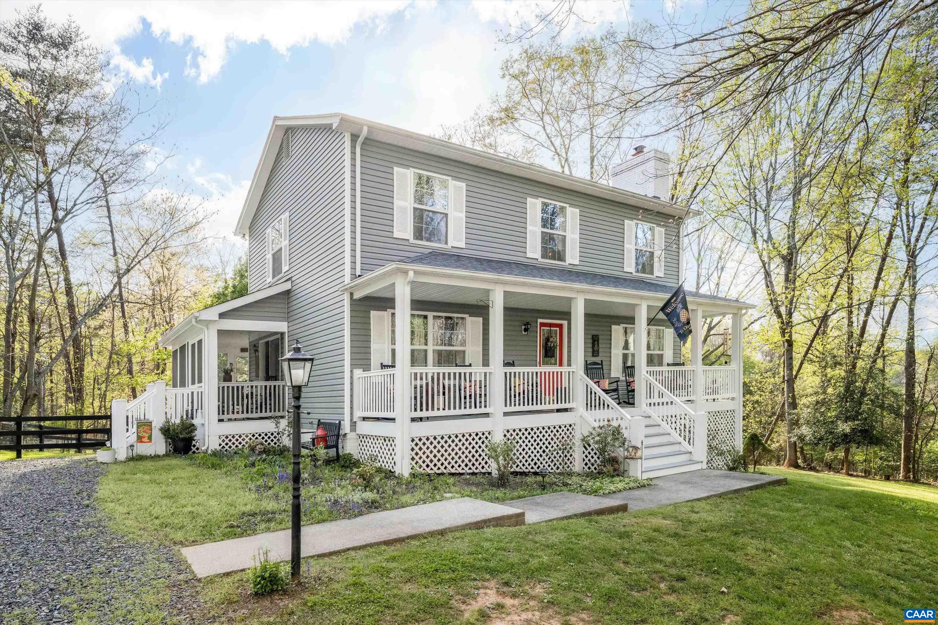 OPEN HOUSE SUNDAY, APRIL 27 1-3PM! Welcome to this stunning home nestled on a picturesque two-acre lot in beautiful Barboursville, VA. Built in 1992 and lovingly maintained by its original owners, this is the first time the home has been offered on the market. Surrounded by mature trees and lush landscaping, the property offers peace, privacy, and timeless charm. You'll love the fenced yard, perfect for pets or gardening, along with the spacious screened-in porch and covered front porch—ideal for relaxing or entertaining. Inside, the main level features a cozy living room with a gas fireplace, a formal dining area, and a well-appointed kitchen with direct access to the porch. A main floor bedroom and full bath (currently set up as a TV room) offer flexibility for guests or a home office. Upstairs, the primary suite includes an ensuite bath and walk-in closet, along with two additional bedrooms and a bonus office space. The walk-out basement is unfinished and ready for your vision. With a new roof installed in 2019 and located just one mile from scenic Preddy Creek Park and trails, this one-owner home is a rare find that perfectly blends comfort, nature, and convenience.