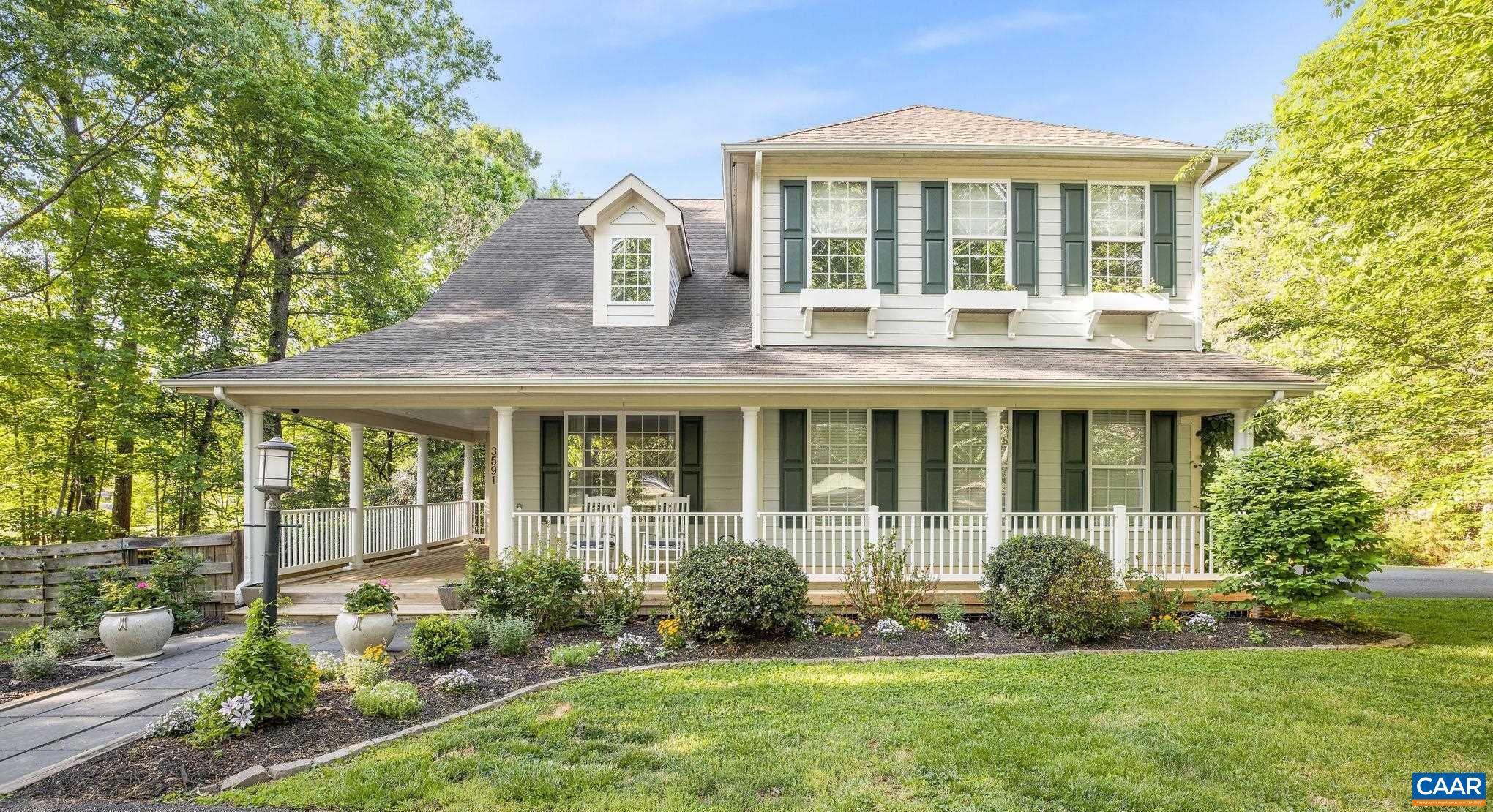 This cheerful Western Albemarle 5 bedroom was built by a respected local builder in 2003. The current owner has further improved the home with extensive recent renovations including a new kitchen and primary bath, as well as by adding a 5th bedroom/guest suite on the terrace level.  The lower level features a playroom complete with built-in playhouse and slide.  All appliances are 4 years old or younger (dishwasher is brand new) and there is new flooring on the 1st and 2nd floors. The floor plan is light, bright and open, with soaring ceilings on the 1st floor. The laundry room is conveniently located on the 2nd floor.  Outdoor spaces include a wonderful covered rear porch, patio with pavers and a firepit.  The 2nd floor HVAC system is new.  Located about 10 minutes west of Barracks Road shopping and about 8 minutes to Ivy Elementary School.