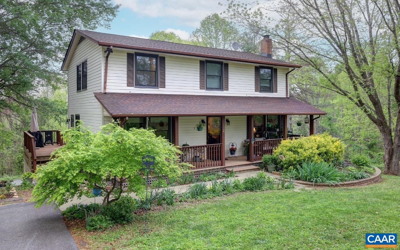 Check out this 4 bed 2 bath two story country home on 2 private acres. Enjoy two primary suites, one on the main floor and another on the second floor. Renovated kitchen offers tile floors, stainless steel appliances, solid wood cabinets, and granite counter tops and kitchen island. No cold showers with this tankless water heater. Wonderful large wrap-around trex deck to enjoy mountain views out back and a spacious covered front porch. Invisible dog fencing to keep your pet safe and secure. Crawl space is tall and provides additional storage. Whole house generator with 10 yr transferable warranty. Walking distance to Michael Shaps Winery. Just 8 miles/12 minutes to Walnut Creek Park, 15 minute drive to Scottsville and Wegmans in Charlottesville - only 20 minutes to Pantops. Offers will be reviewed 7 pm Sunday Owner reserves right to accept prior to that time.