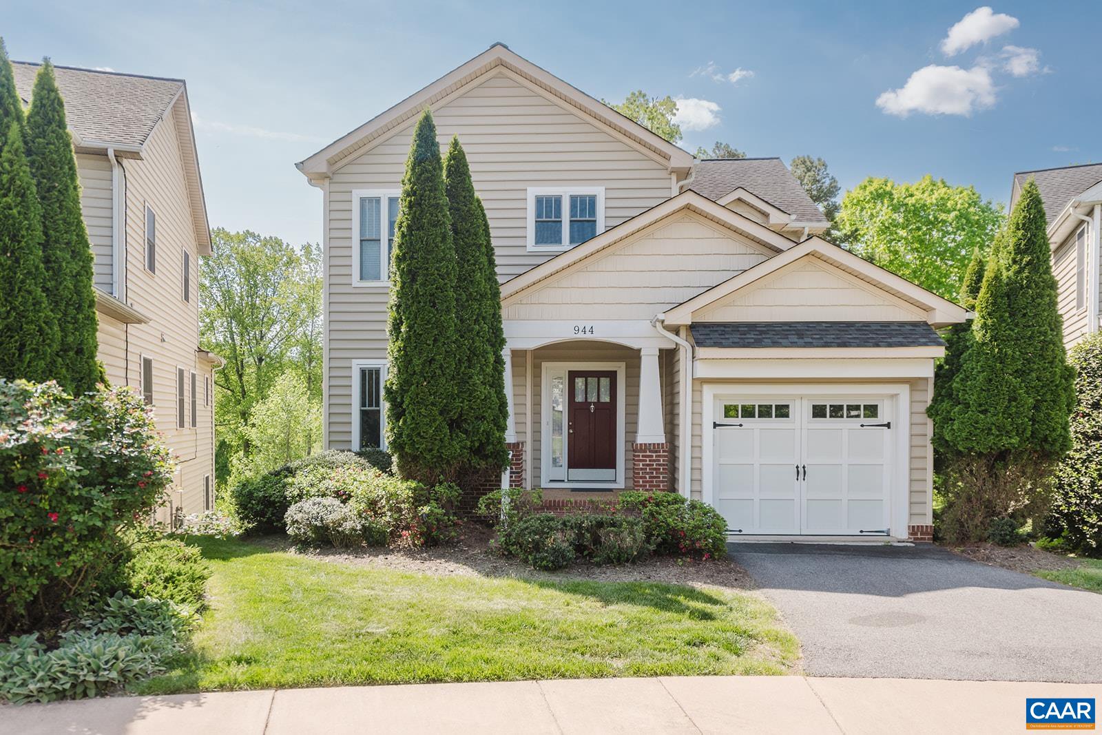 Walk to Downtown/UVA while also enjoying this retreat-like setting as this home overlooks Moore's Creek/Rivanna Trail/City Parkland!Main level living--Large living room, dining, & kitchen, 1st Fl Master BR w/spacious en suite bath. Upstairs, 2nd Master Suite, 2 additional bedrooms, open loft area with quaint nook, perfect for office space. In-law/guest suite potential w/ full finished walk-out basement, flushed with light, includes additional bedroom, full bathroom and large bonus space. Walk out from basement to rear covered patio and rear deck overlooking amazing views. Sweet home located on cul-de-sac with convenient Pocket Park. Lawn Maint. included in HOA fees. City living & convenience while enjoying mountain & river views.