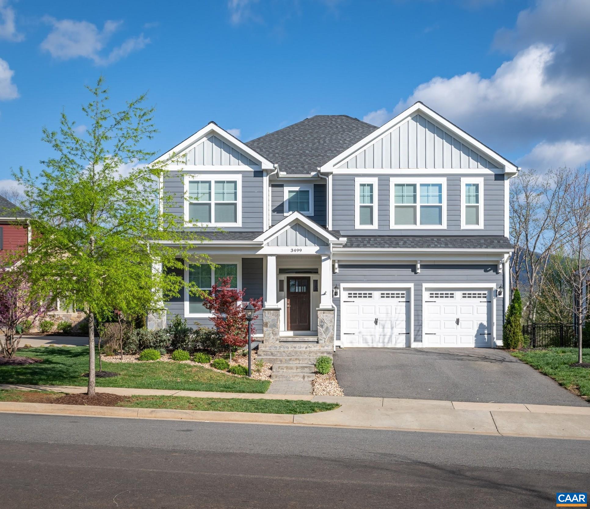 OPEN SUN, 5/4, 1-4. Welcome to this stunning home with a VIEW in the heart of everything! Views of the Blue Ridge Mountains from every window in rear of home. Move right in without the wait or cost of new construction. The front porch beckons you to relax and visit w/ neighbors. Wonderful open concept layout will be sure to please! Dedicated home office w/ shadow box molding. Welcoming living room w/ gas fireplace as the focal point. Sunny dining area off charming screened porch. Chef's kitchen w/ stainless GE appliances, exquisite granite counters and island w/ breakfast bar. Awesome mud room off 2 car garage. Attractive, durable LVP flooring throughout main level. Upstairs boasts a lavish primary suite + 3 bedrooms w/ walk-in closets & ensuite baths. Terrace level offers a 5th bedroom, 4th bath, an outstanding media/rec room + a great storage room. The "piece de resistance" is the GORGEOUS patio w/ built-in hot tub! Entertain friends & family and bask in the magnificent sunsets and glorious sounds of nature. Life as it's meant to be lived! Backs to Old Trail Park and Lickinghole Creek. Stroll to OT Village, pool, golf, play area, downtown Crozet & three schools. Short drive to hiking trails, swimming holes, breweries & wineries.