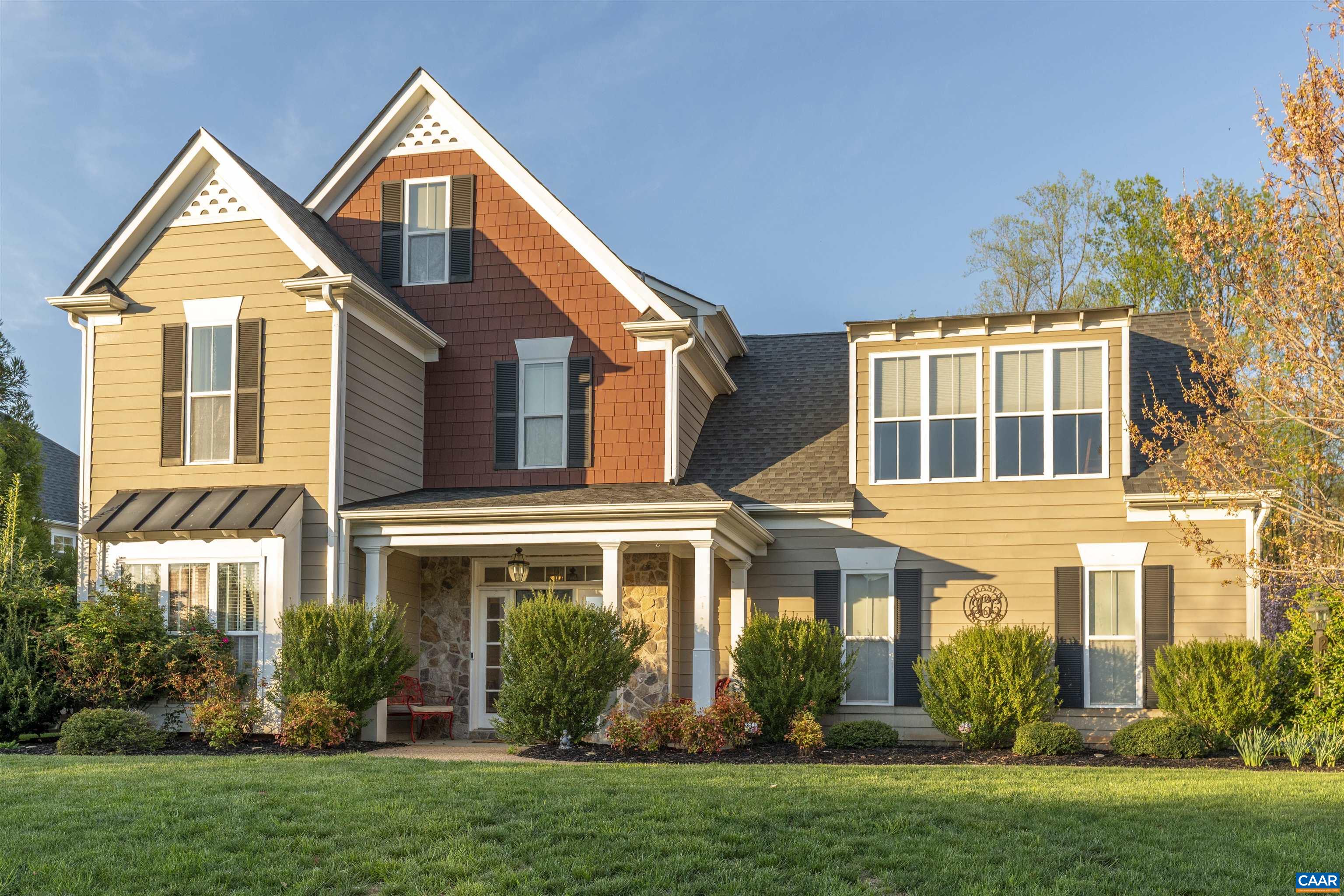 Open House Saturday 1-3:00 Step inside this thoughtfully designed home and discover warm, inviting spaces filled with character. You'll find custom bookcases and pocket doors in the home office, a stunning tray ceiling in the family room, and a double-sided fireplace that creates a cozy connection between the living space and the expansive screened-in porch. At the heart of the home, the chef's kitchen is a true showstopper. Designed for the serious cook and the casual host alike, it features a gas cooktop, wall oven, farmhouse sink, granite countertops, a generous pantry, and a butler’s pantry complete with wine cooler and a built-in kegerator. The primary suite is a true retreat, with a luxurious bathroom that includes a tub and an oversized shower with dual shower heads and Spanish Dekton tile. The bright and spacious recreation room offers stunning views. And when it’s time to enjoy the outdoors, the backyard is a private haven. A custom patio with a built-in gas grill makes hosting a breeze. The custom fire pit on the elevated terrace allows you to take in spectacular sunsets over the Blue Ridge Mountains. This property blends comfort, style, and unforgettable views—all in a convenient location to UVA, 64 & the downtown mall.